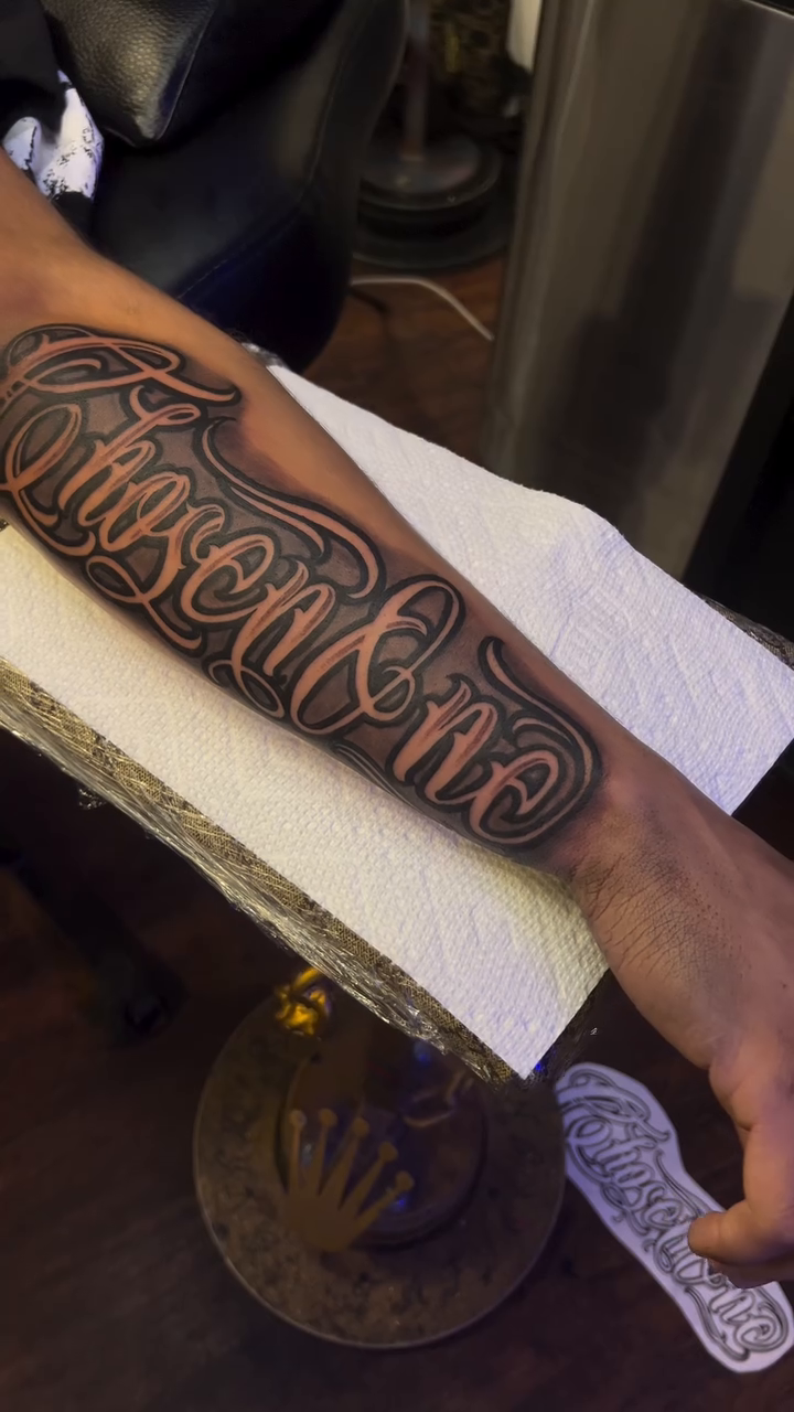 Chosen One lettering script tattoo by Moose