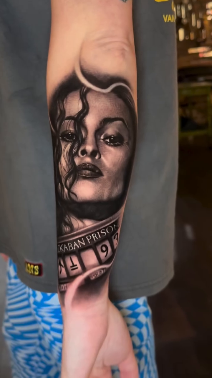 Woman's portrait with prison bars realism tattoo by Ana Reyes