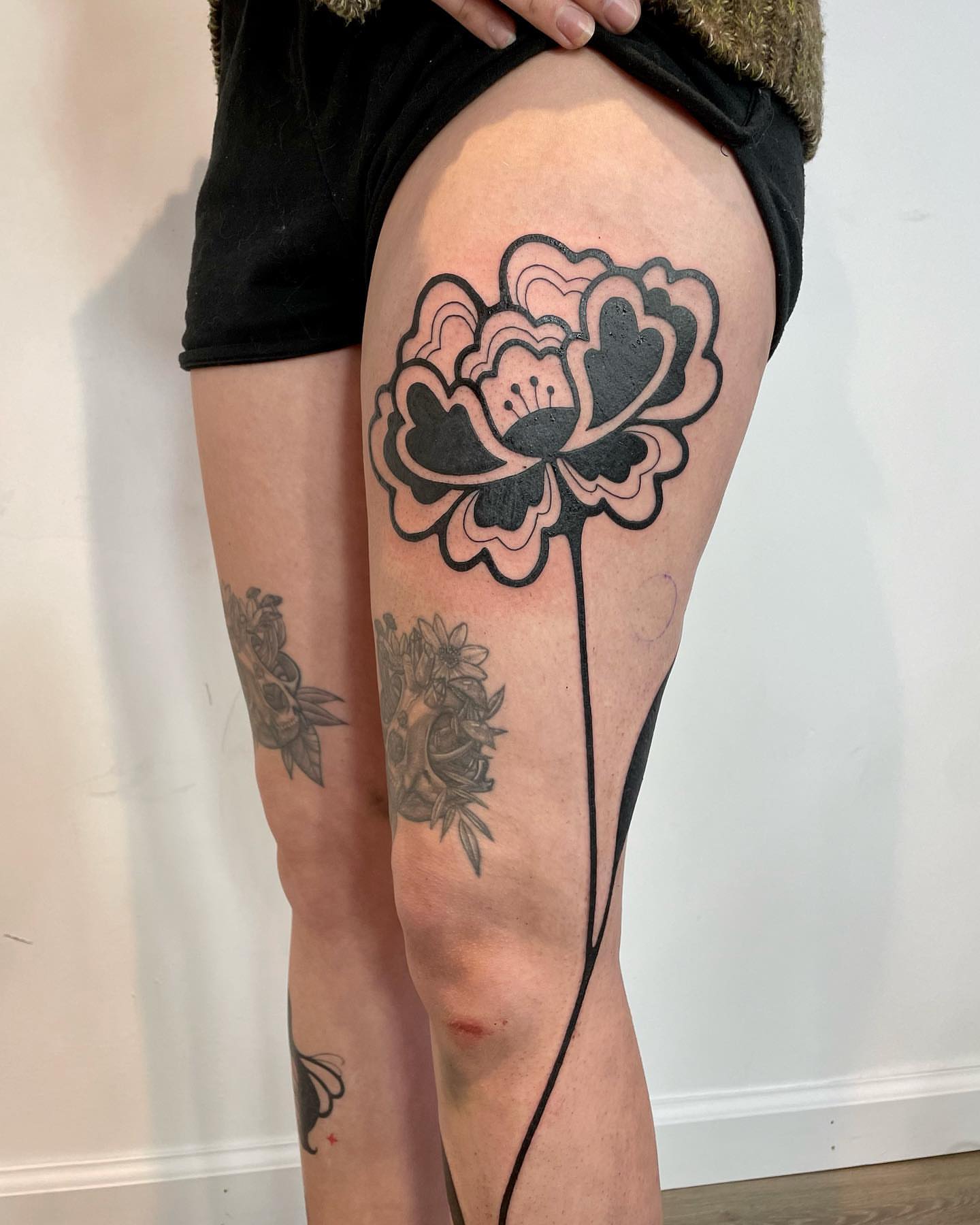 Peony American traditional tattoo on the thigh by sarah ✶