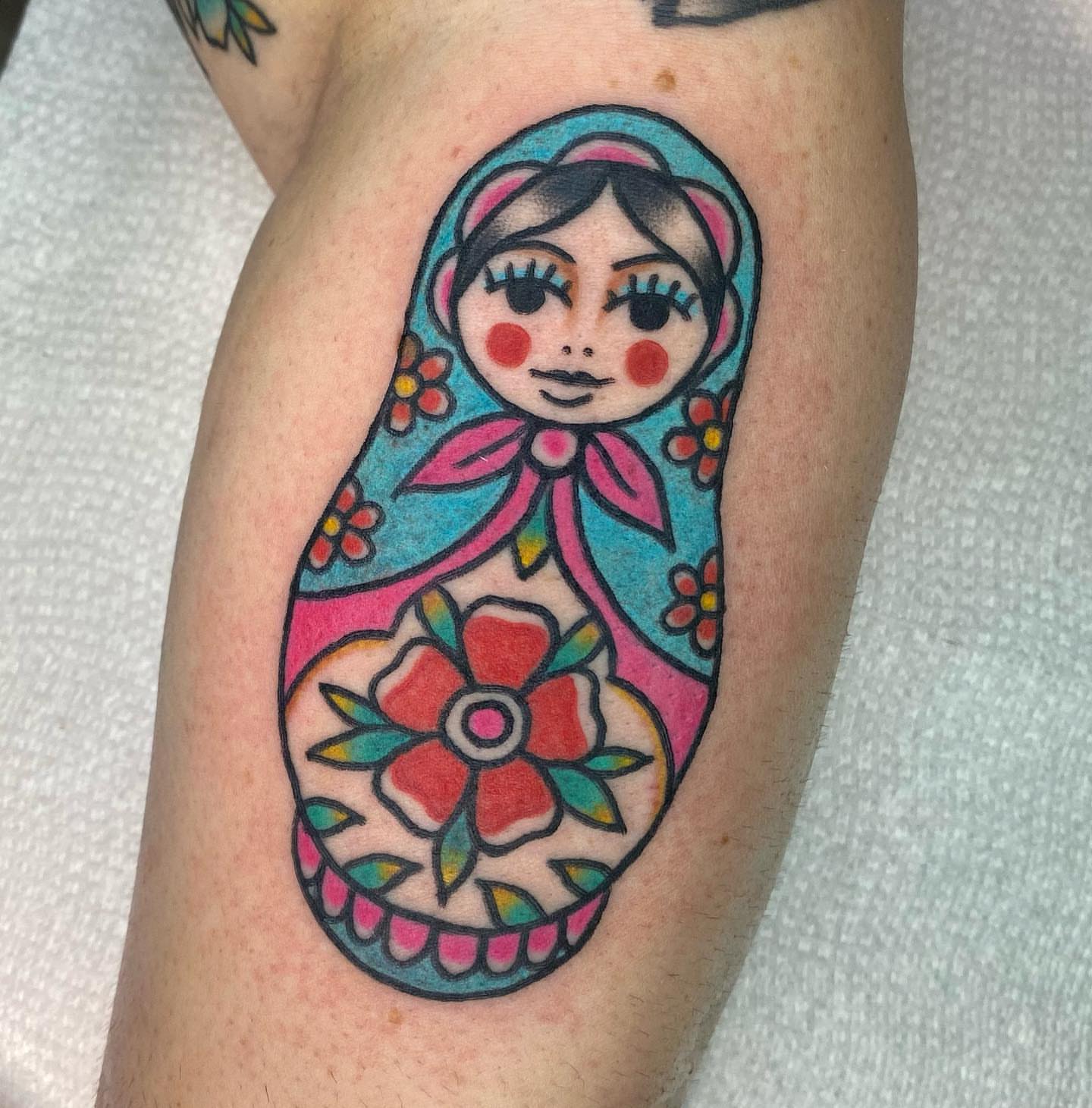 Matryoshka doll American traditional tattoo on the forearm by Shana