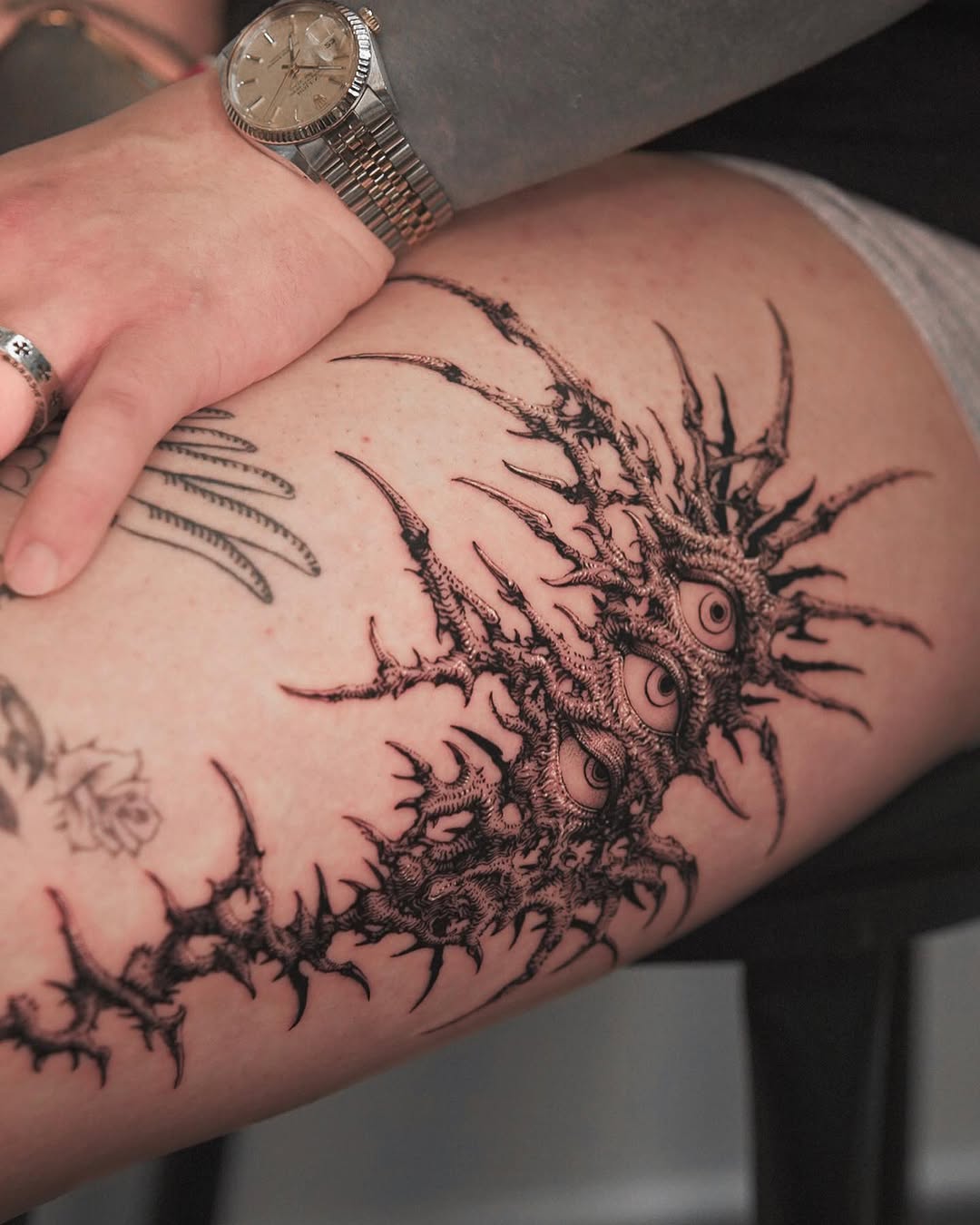 Tattoo by @nowthisyujhi — blackwork, dark_realism