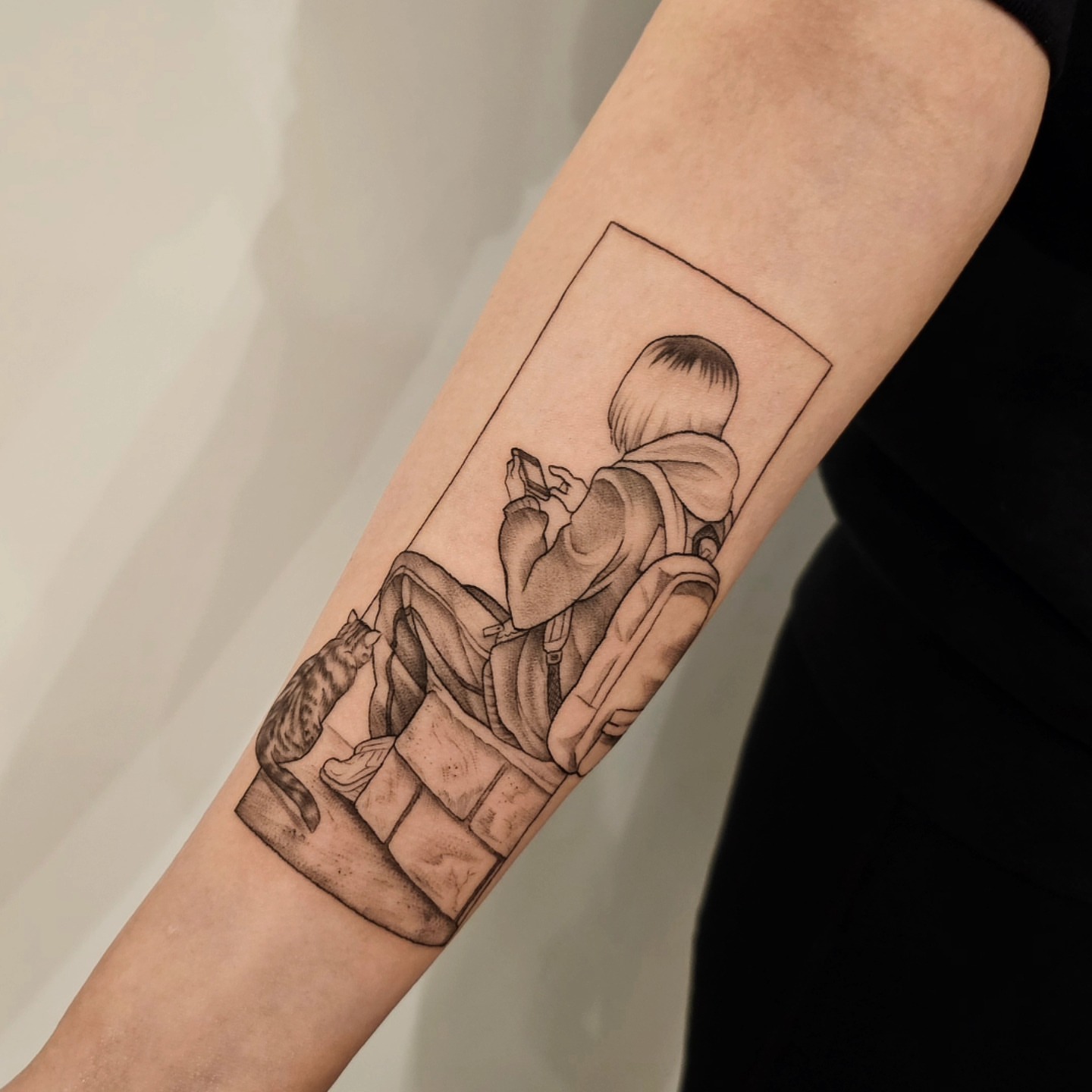 Man reading realism tattoo on the forearm by Lynx, Cincinnati, Ohio