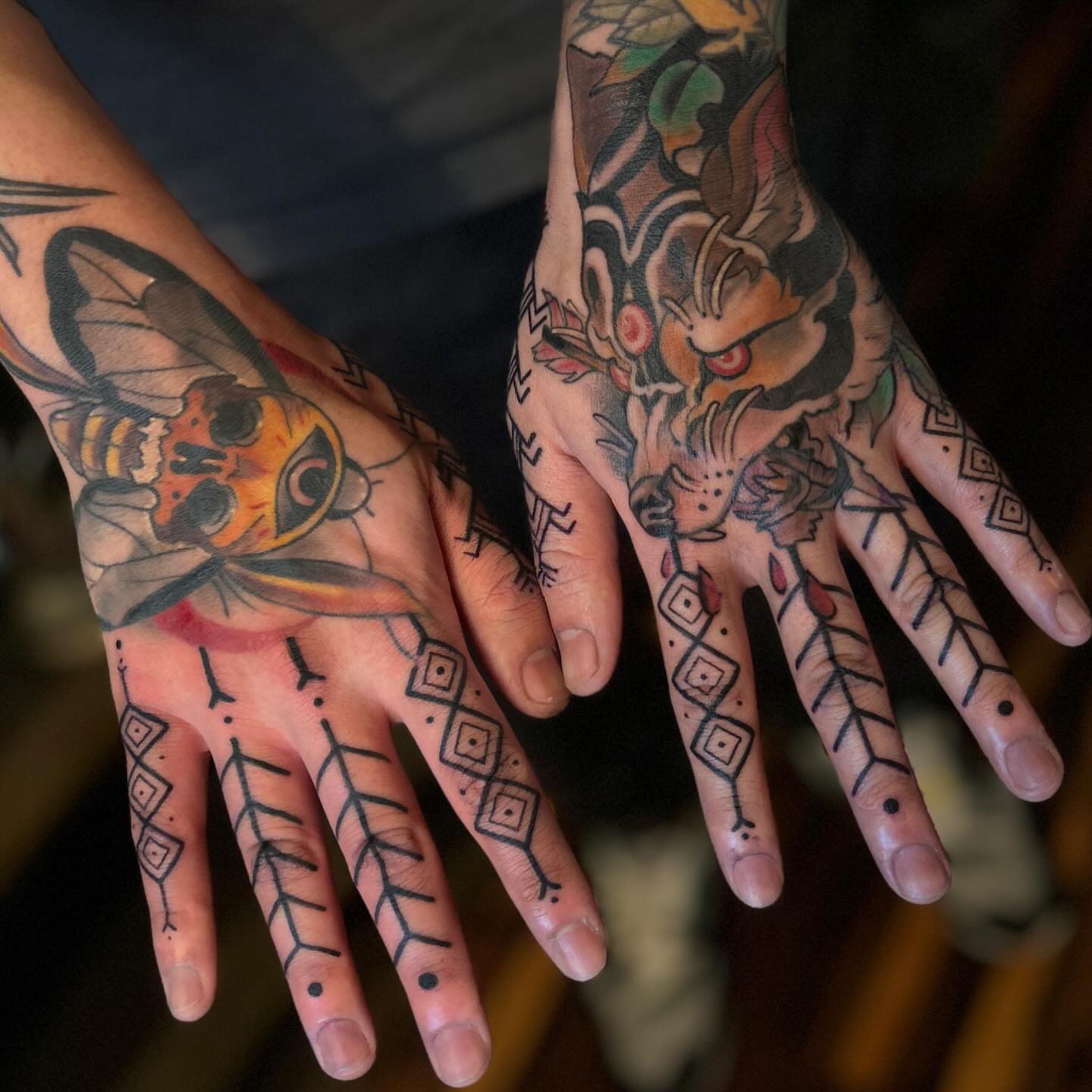 Insect and owl American traditional tattoo on the hand by Rat Girl, Dayton, Ohio