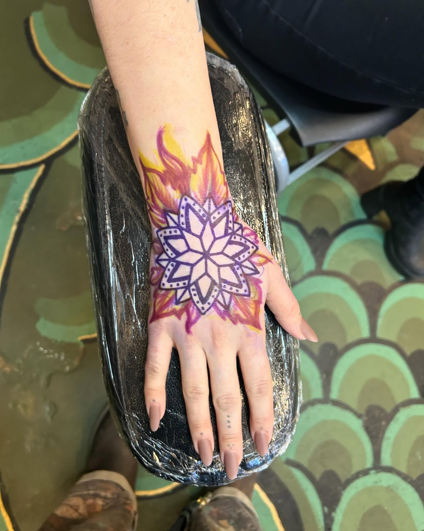 Mandala geometric tattoo on the hand by Sam Perry, Denver, Colorado