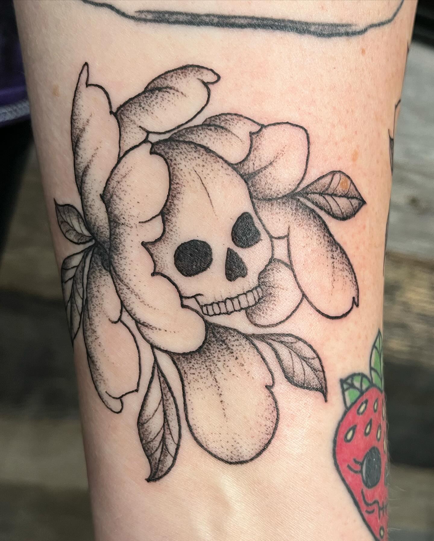 Skull and rose dotwork tattoo on the forearm by Tina Petrullo, West Chester Township, Butler County, Ohio