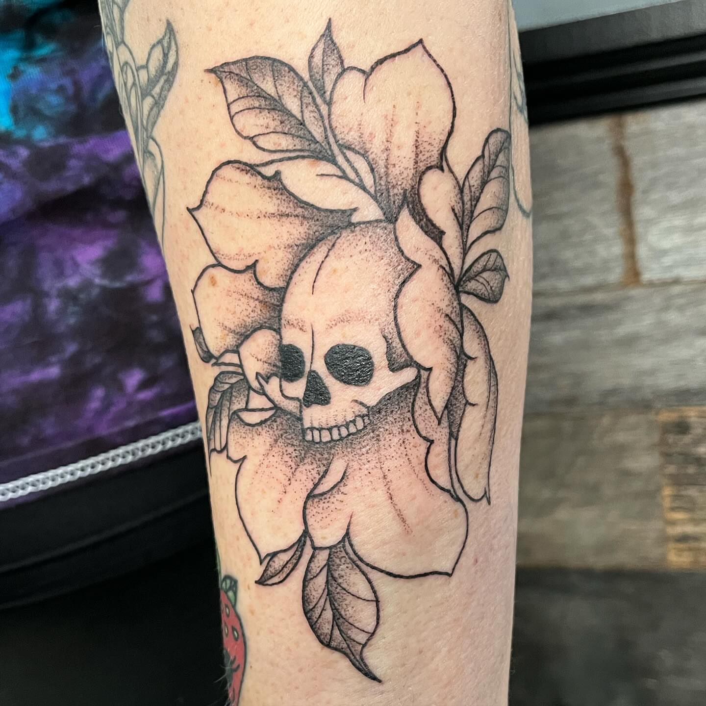 Skull and flower dotwork tattoo on the forearm by Tina Petrullo, West Chester Township, Butler County, Ohio