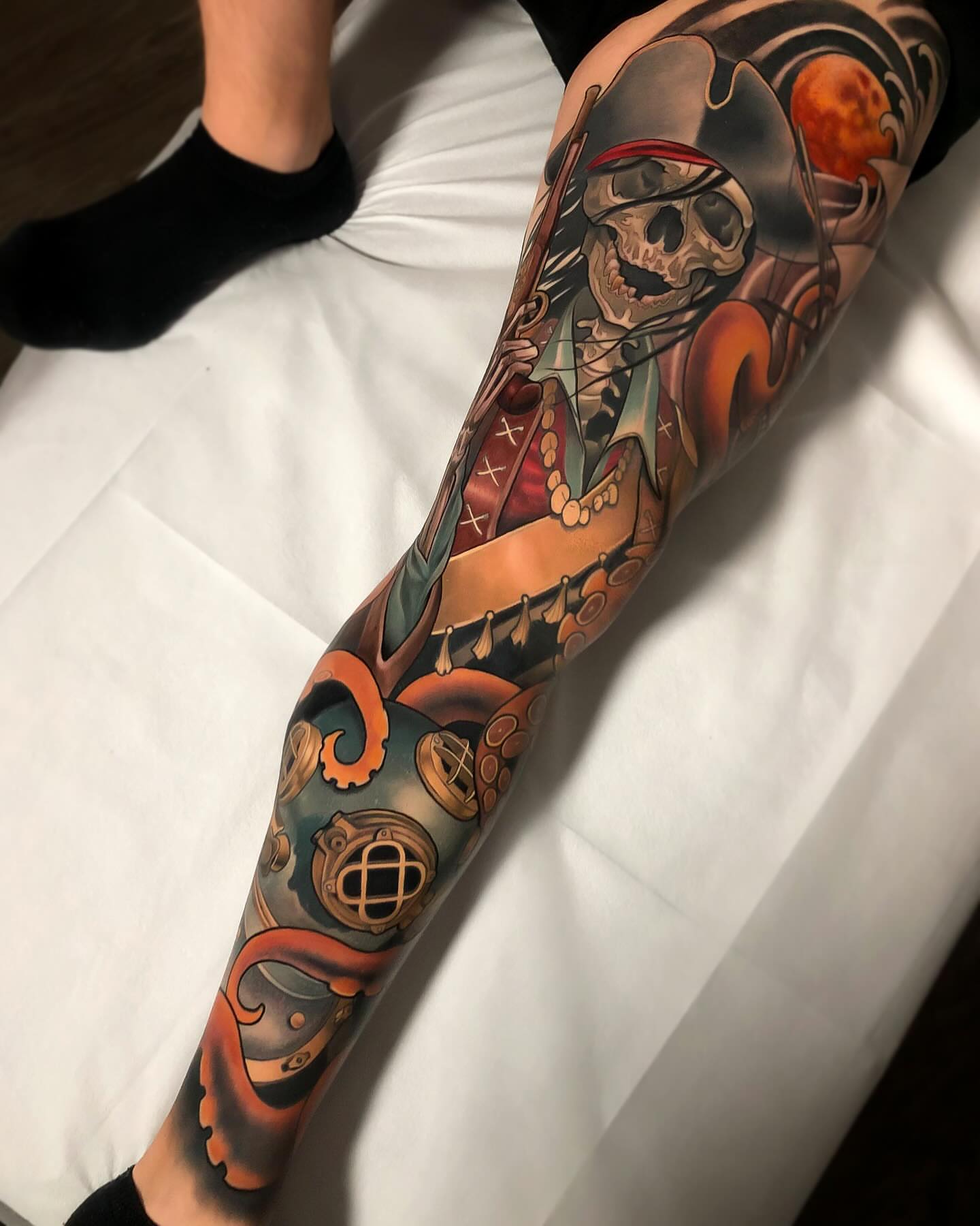 Pirate skeleton neo-traditional tattoo on the forearm by Milo Alfring Tattoo