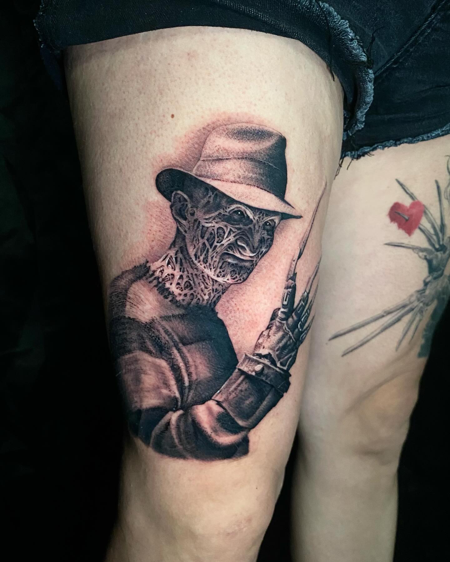Masked man with rifle realism tattoo on the thigh by D Benzo ~ San Diego Tattoo artist ~