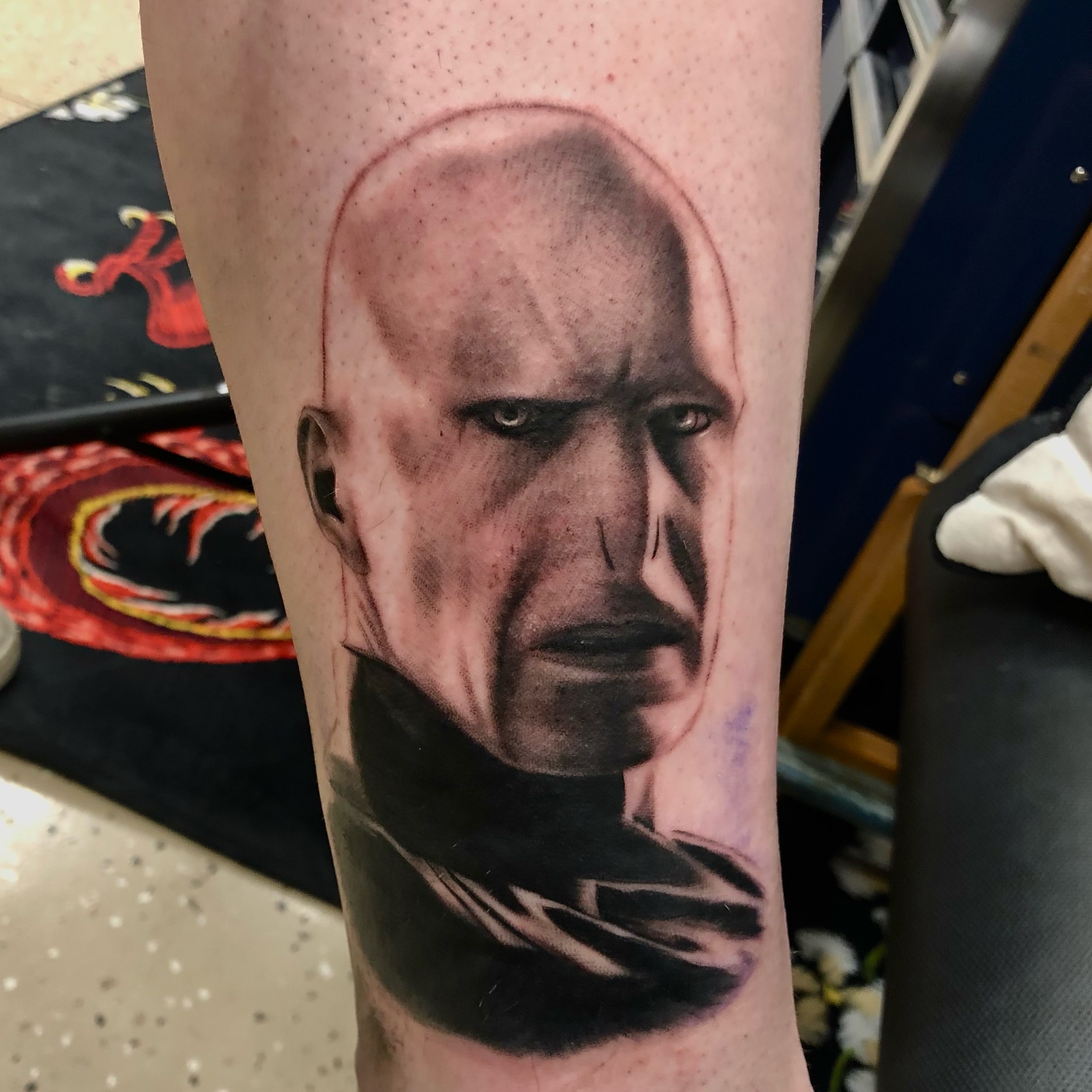 Man's face realism tattoo on the forearm by Ian Chancellor, Leighton Buzzard, England