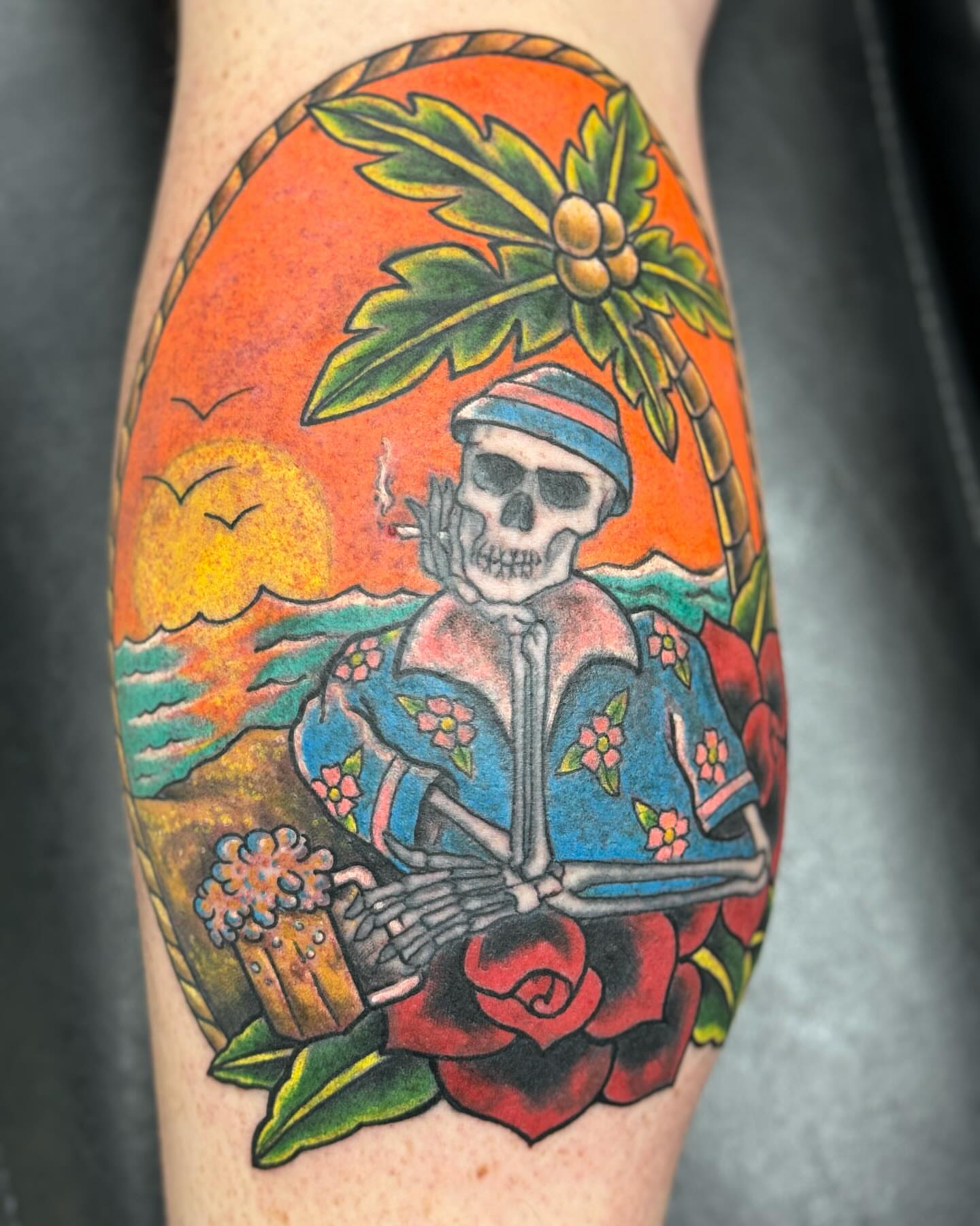 Skeleton smoking cigarette American traditional tattoo on the forearm by Chris Allen Taylor