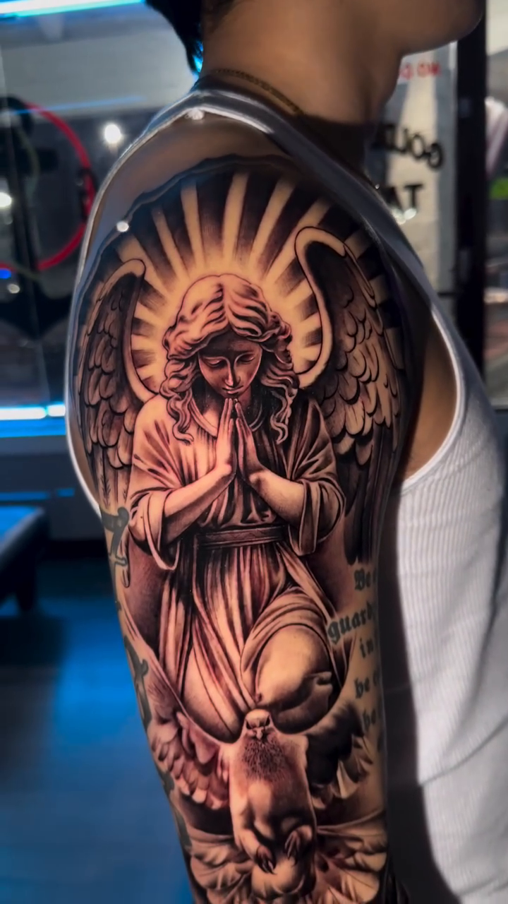Angel with roses and compass realism tattoo by Atlanta Tattoo Artist, Atlanta, Georgia