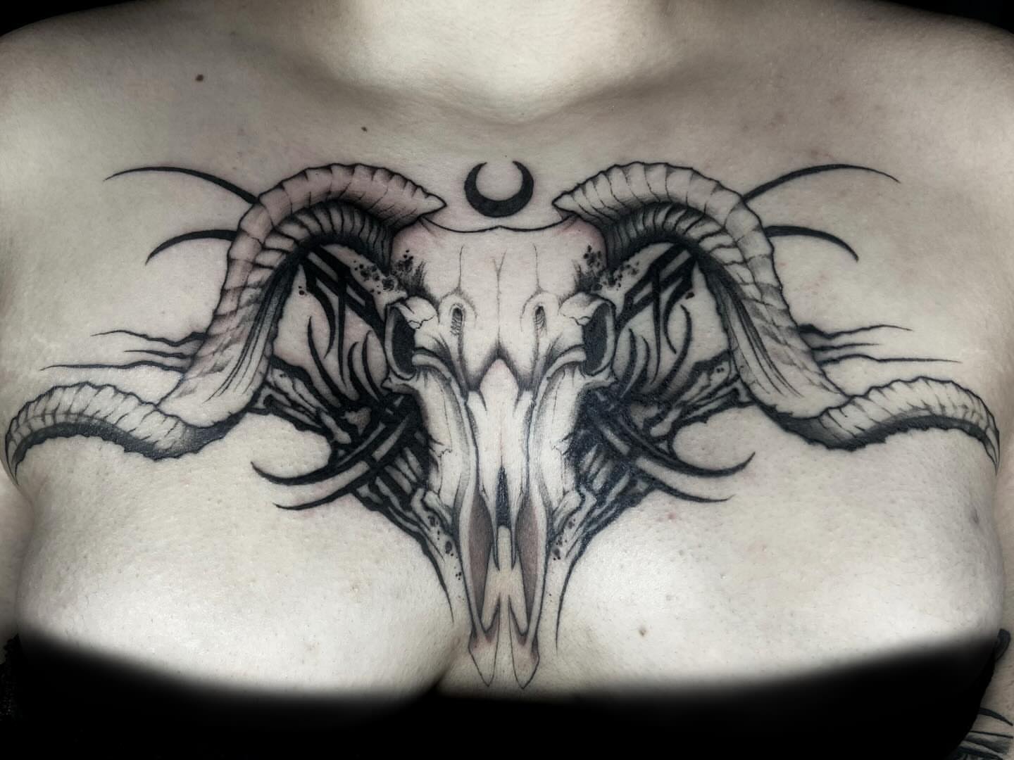 Ram skull realism tattoo on the chest by Nathan