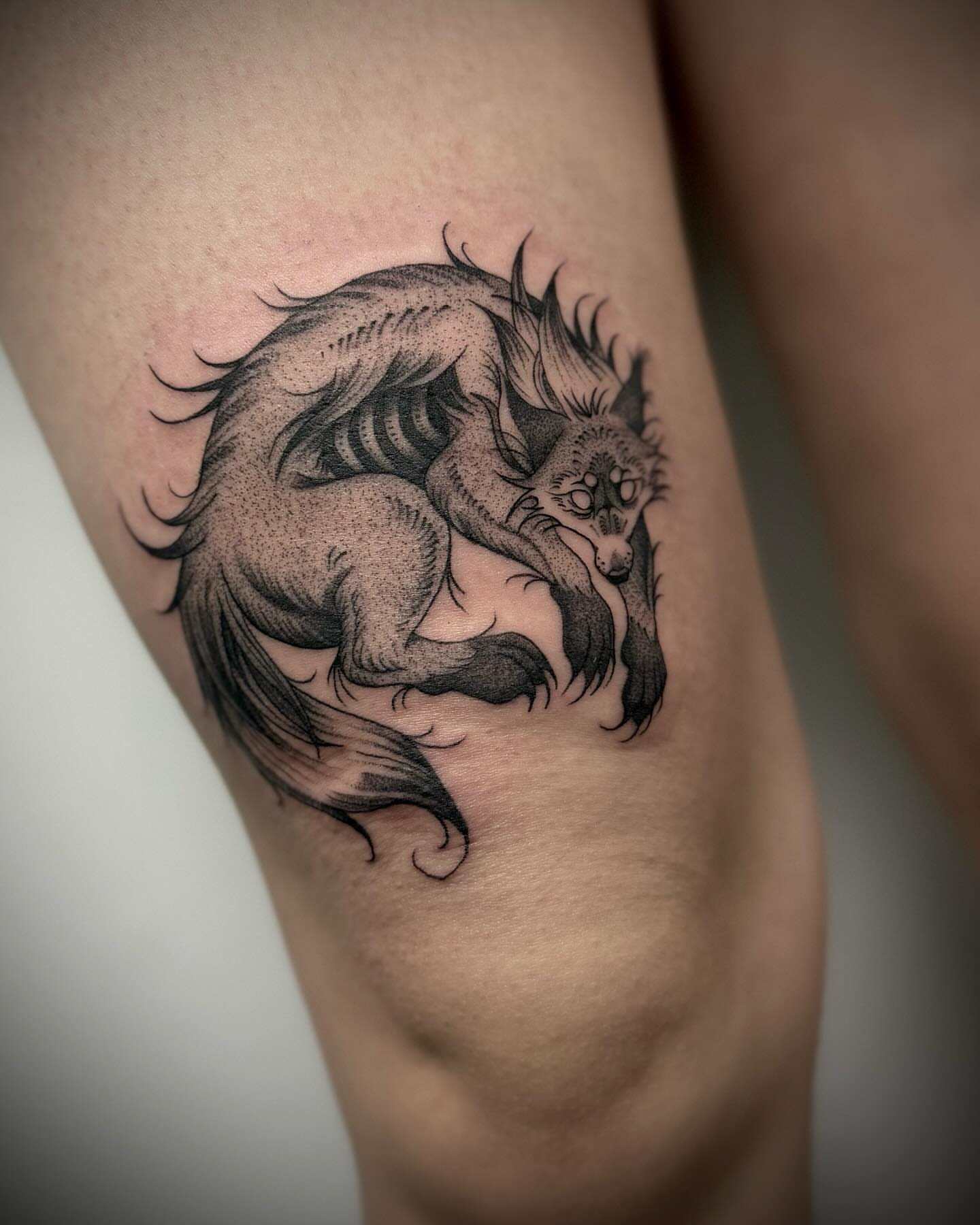 Wolf dotwork tattoo on the thigh by Melanie
