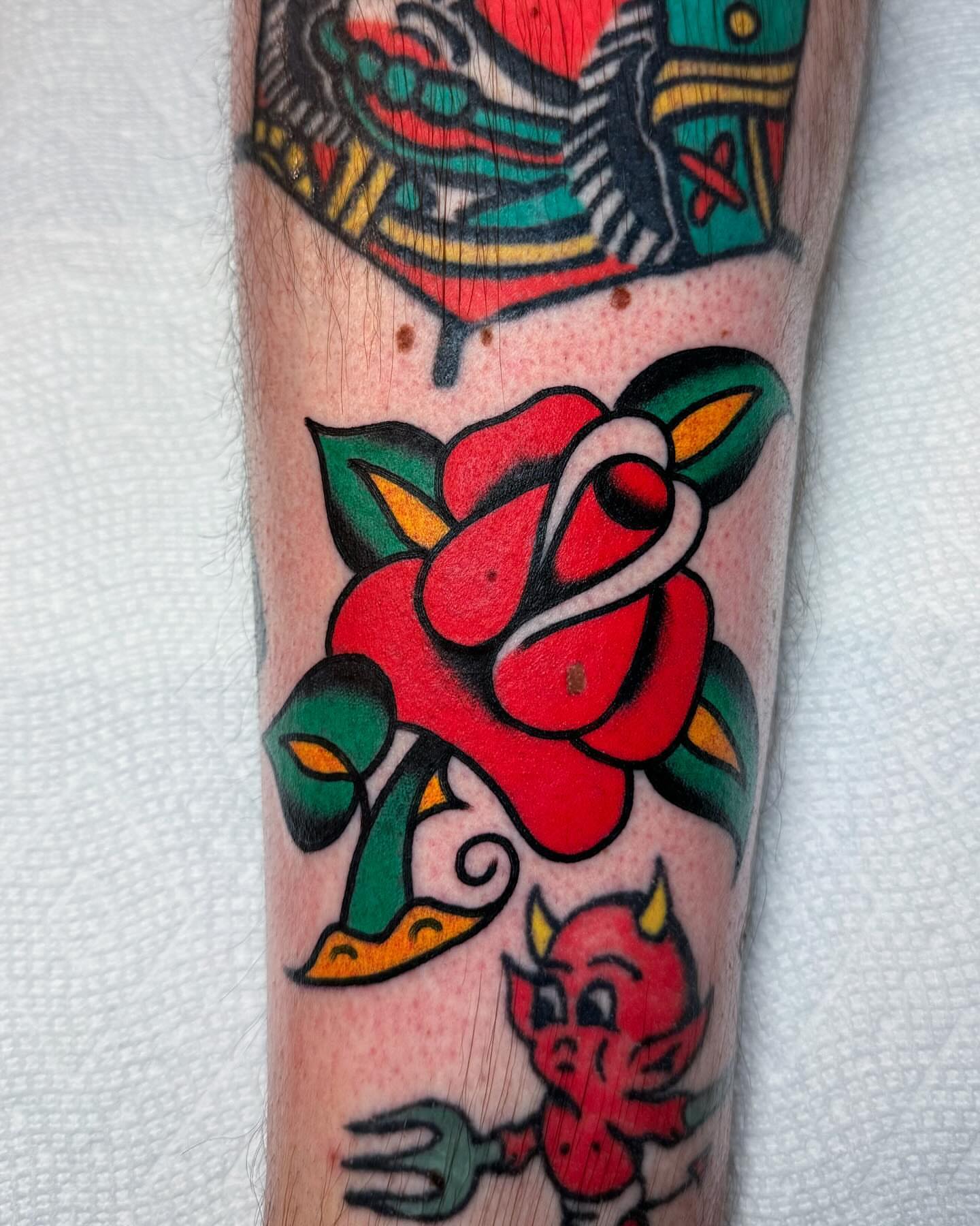 Rose American traditional tattoo on the forearm by James Shepherd, Austin, Texas