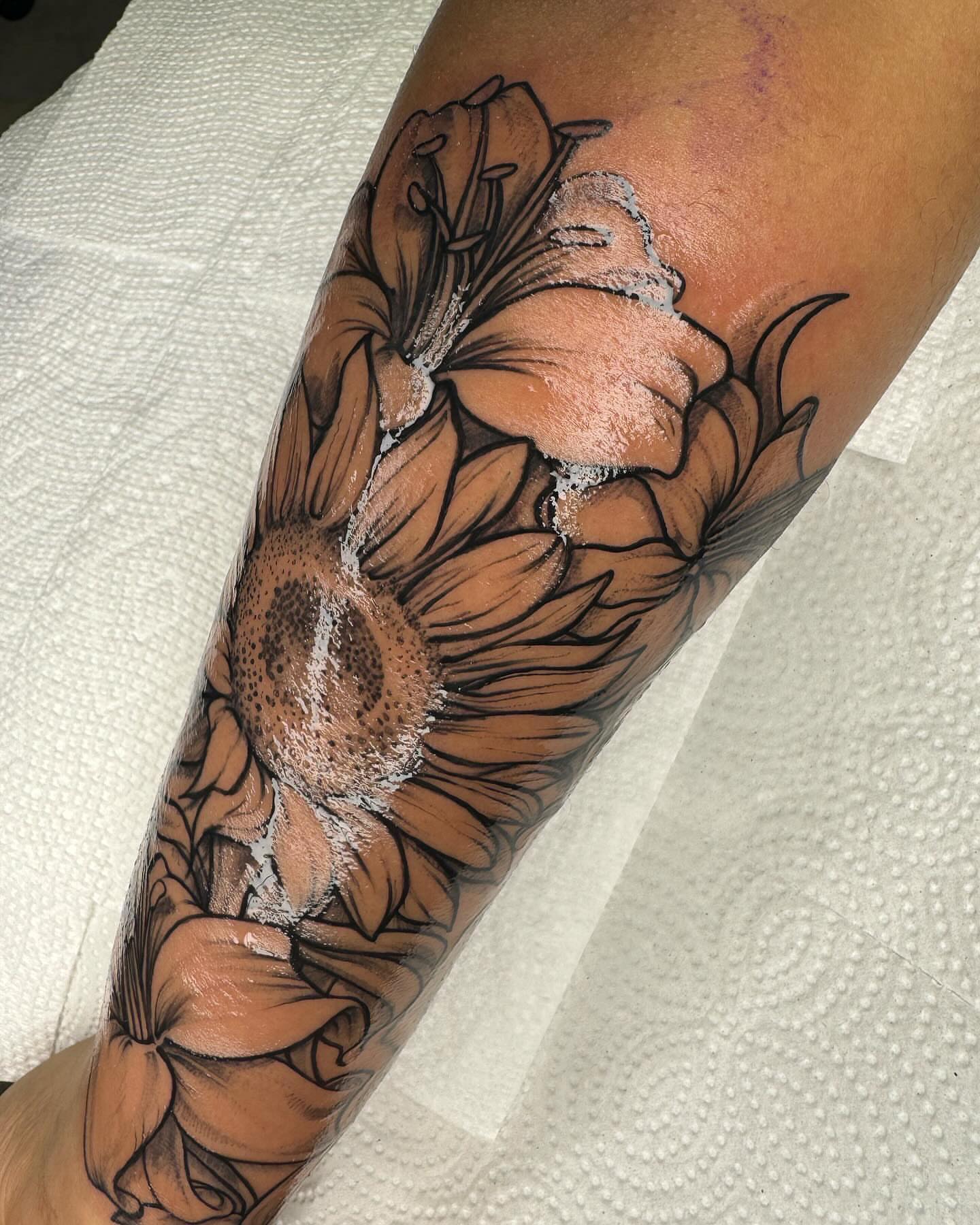 Sunflowers dotwork tattoo on the forearm by @inkhazmat