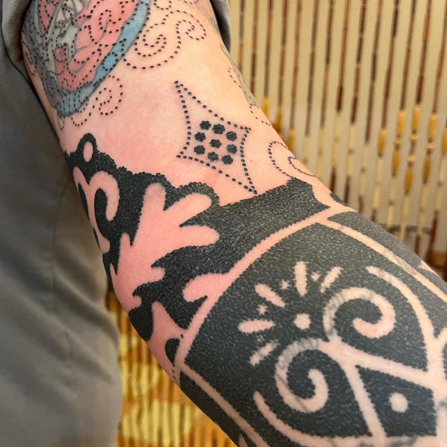 Abstract geometric patterns dotwork tattoo on the forearm by kevvy
