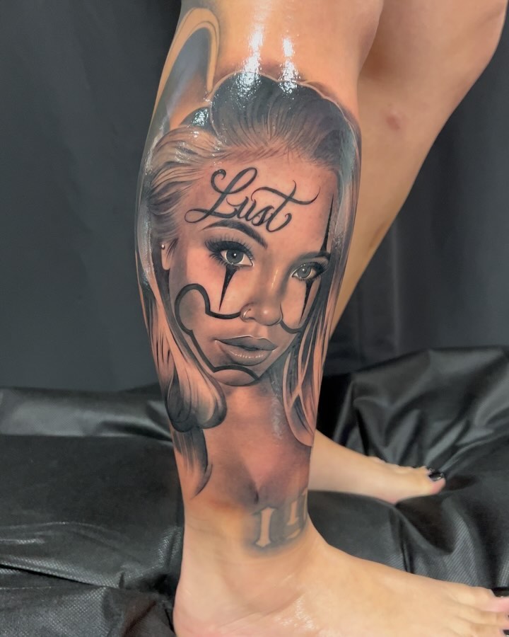 Woman's face realism tattoo on the forearm by Thomas Conard