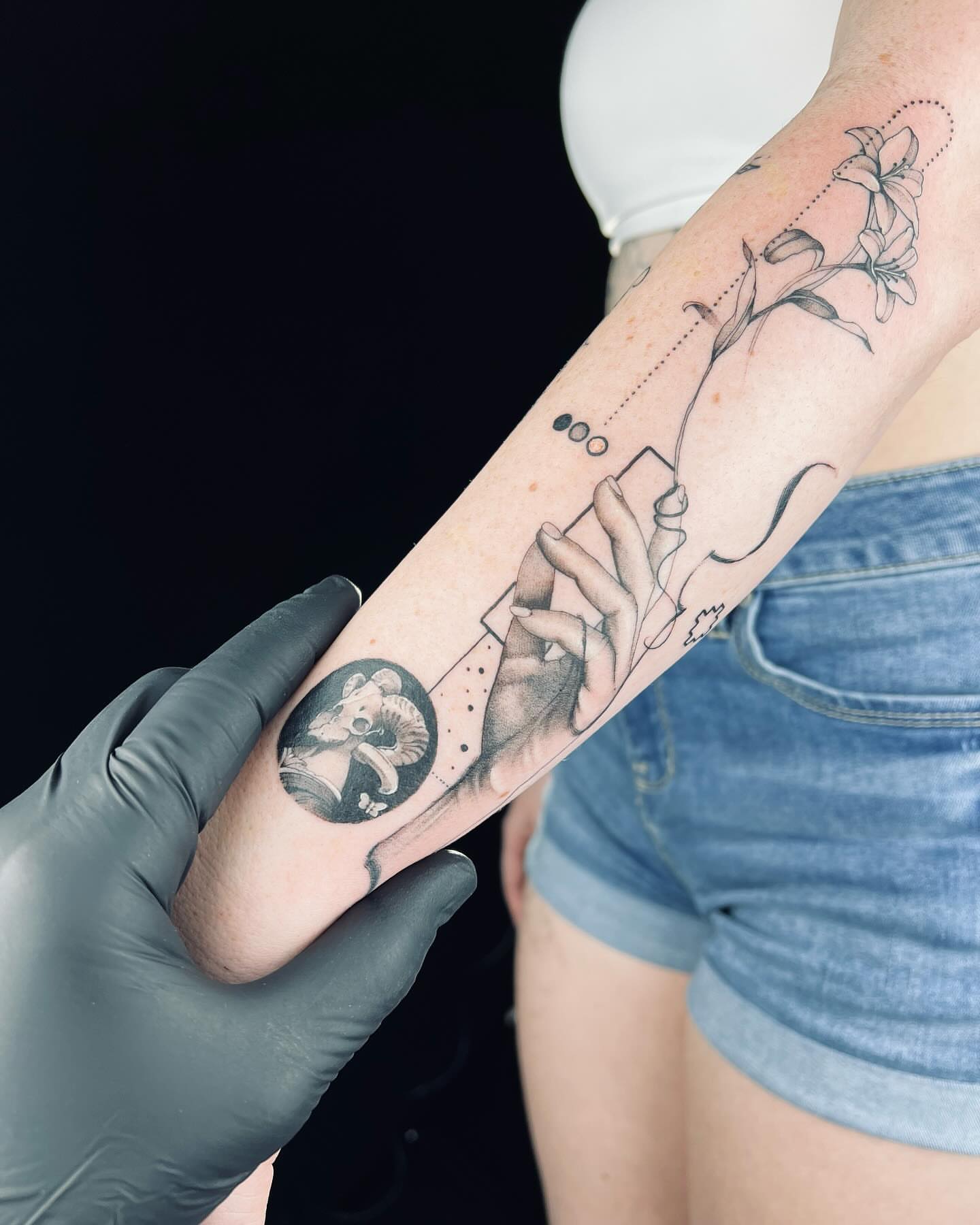 Abstract surrealism surrealism tattoo on the forearm by Apologies tattoo studios.