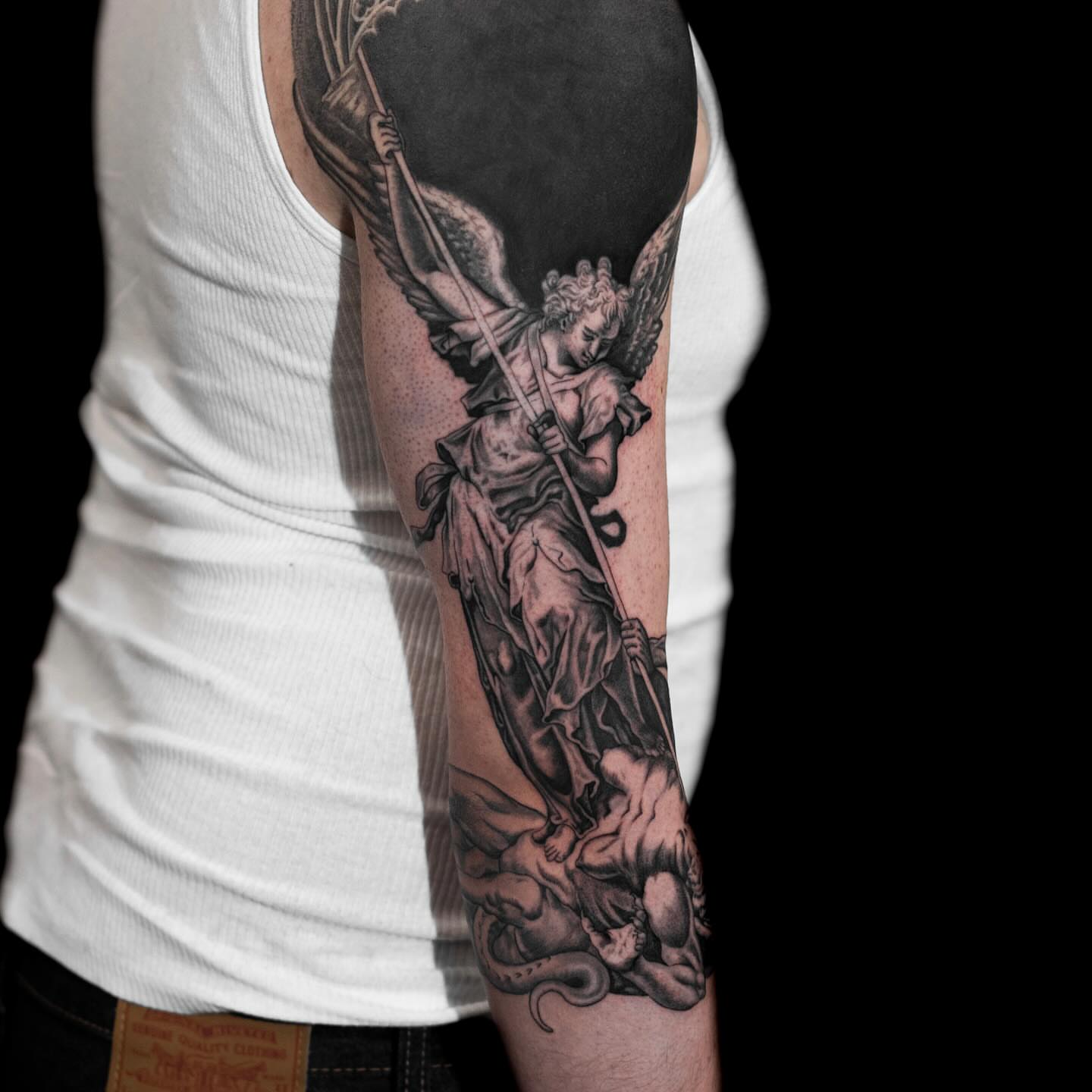 Angel with spear realism tattoo on the forearm by Tattoo Artist