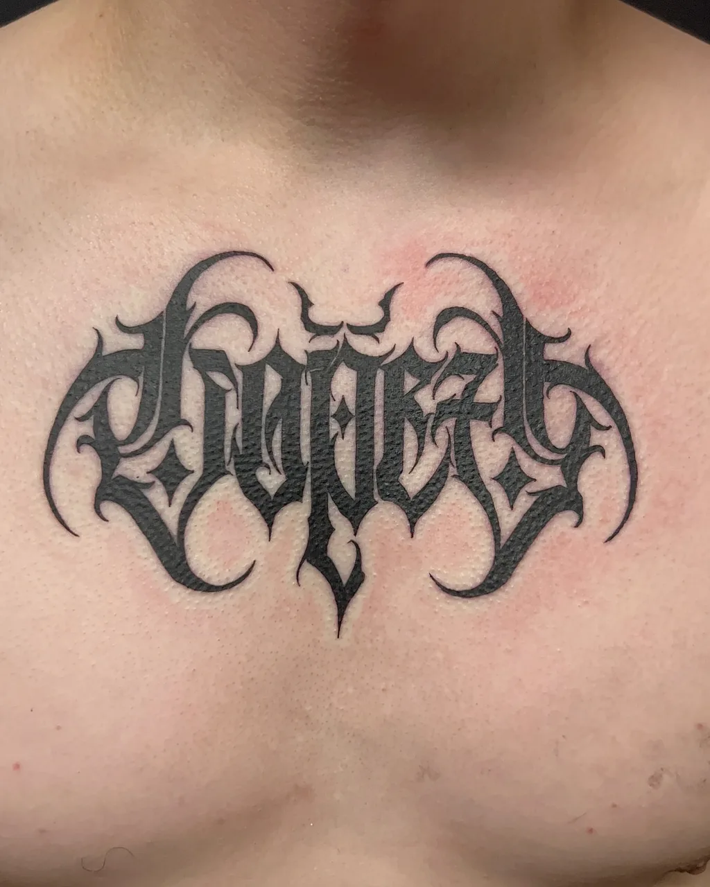 Script lettering lettering script tattoo on the chest by David Xavier Jimenez