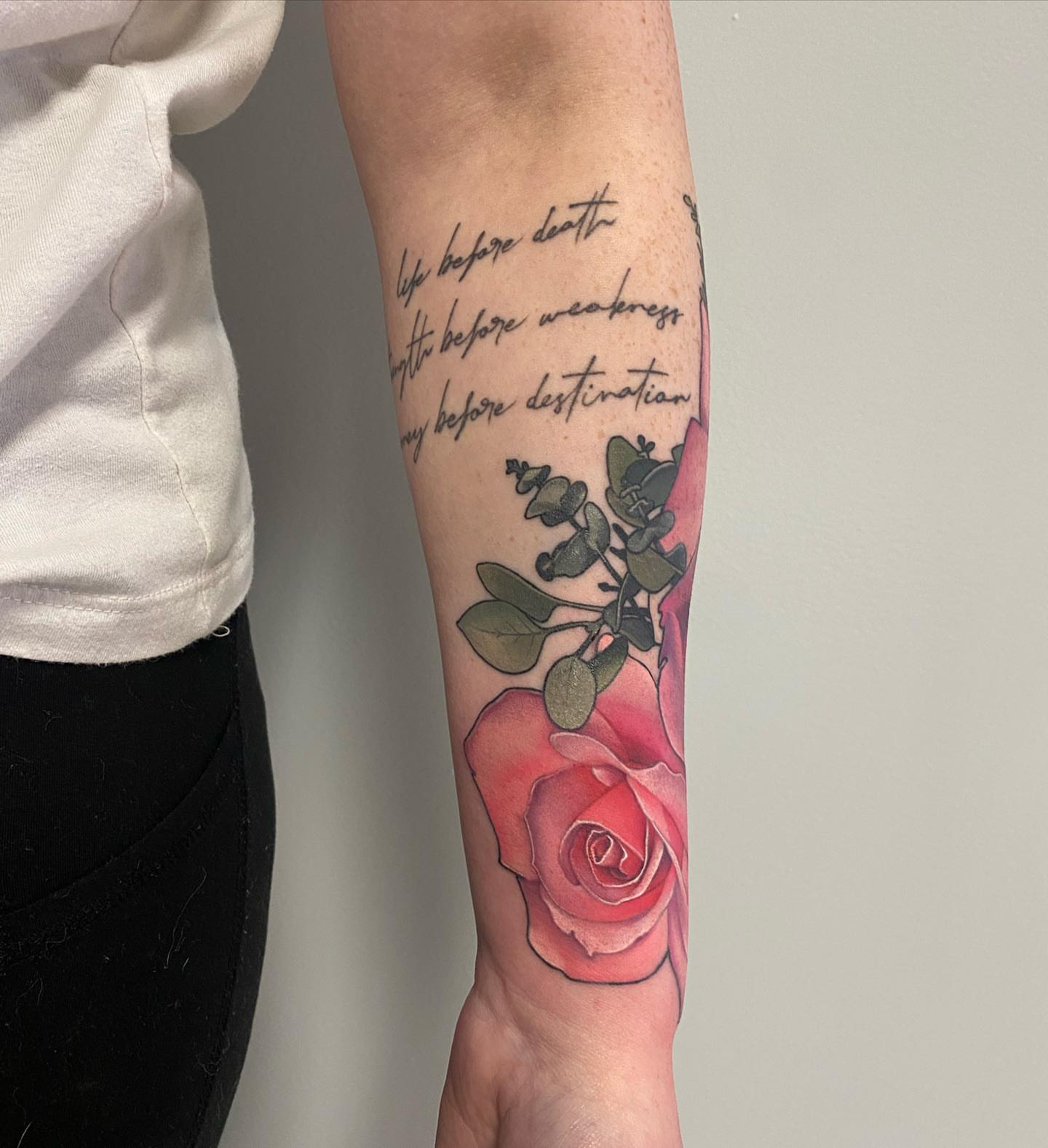 Rose and script realism tattoo on the forearm by Anali De Laney