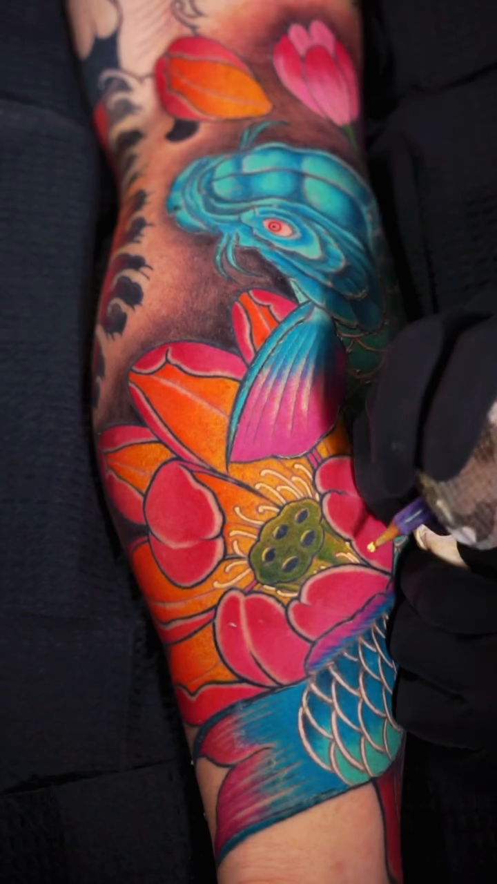 Koi fish and lotus flowers japanese irezumi tattoo by Amaury Ramirez