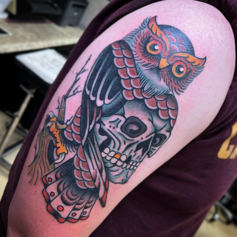 Owl and skull American traditional tattoo on the shoulder by Drew McElveney, Austin, Texas