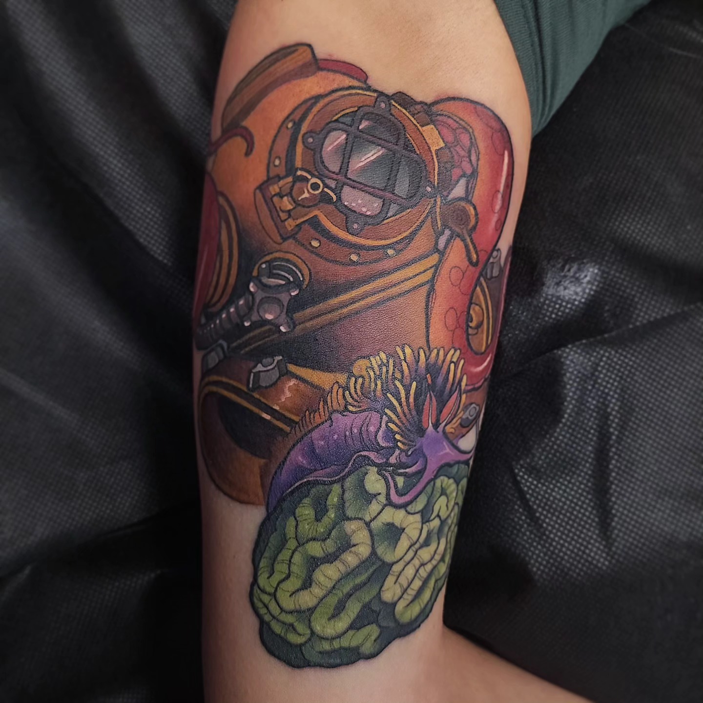 Diving helmet and coral tattoo on the forearm by Joanna Nguyen ♈
