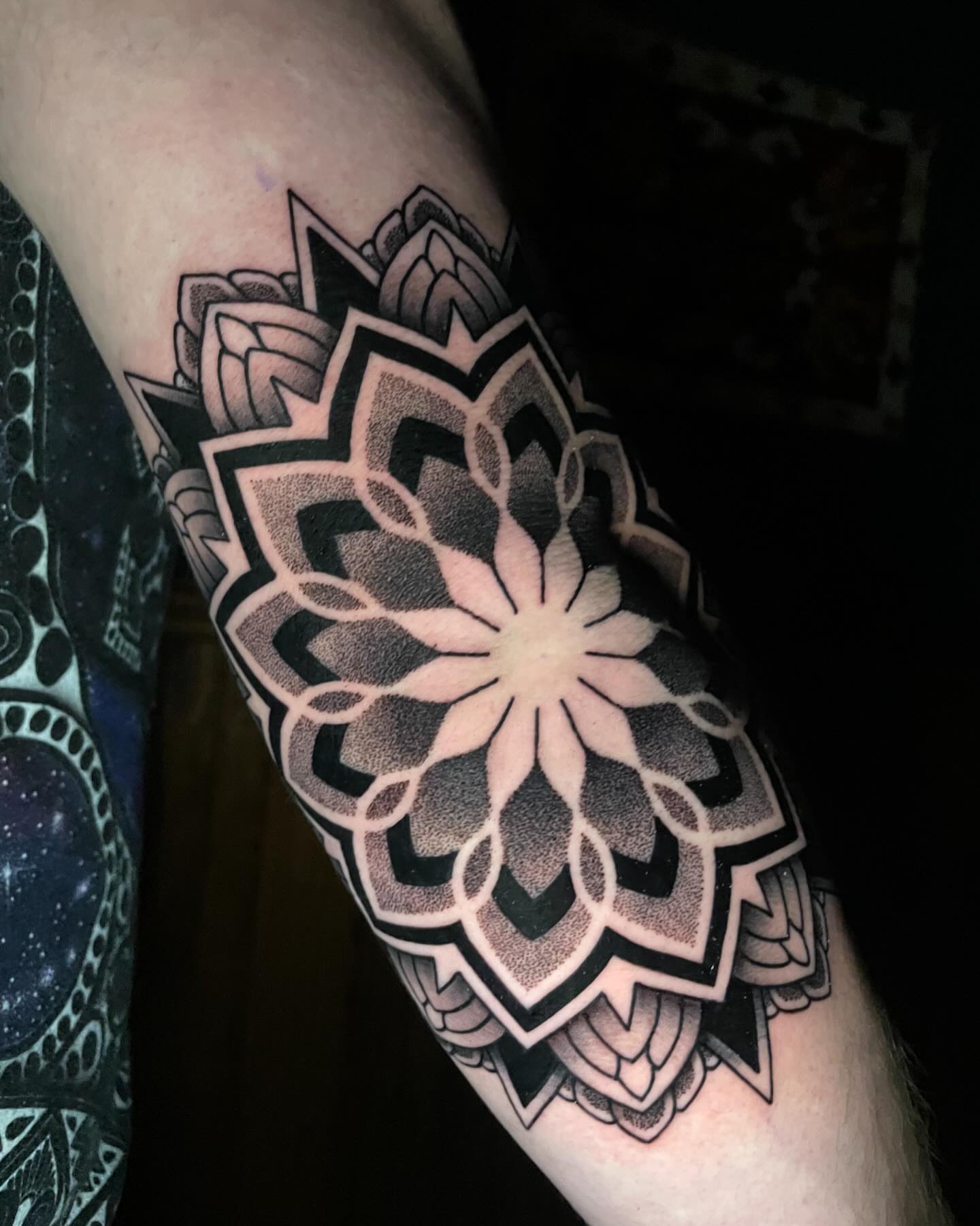 Mandala dotwork tattoo on the forearm by Jason Call
