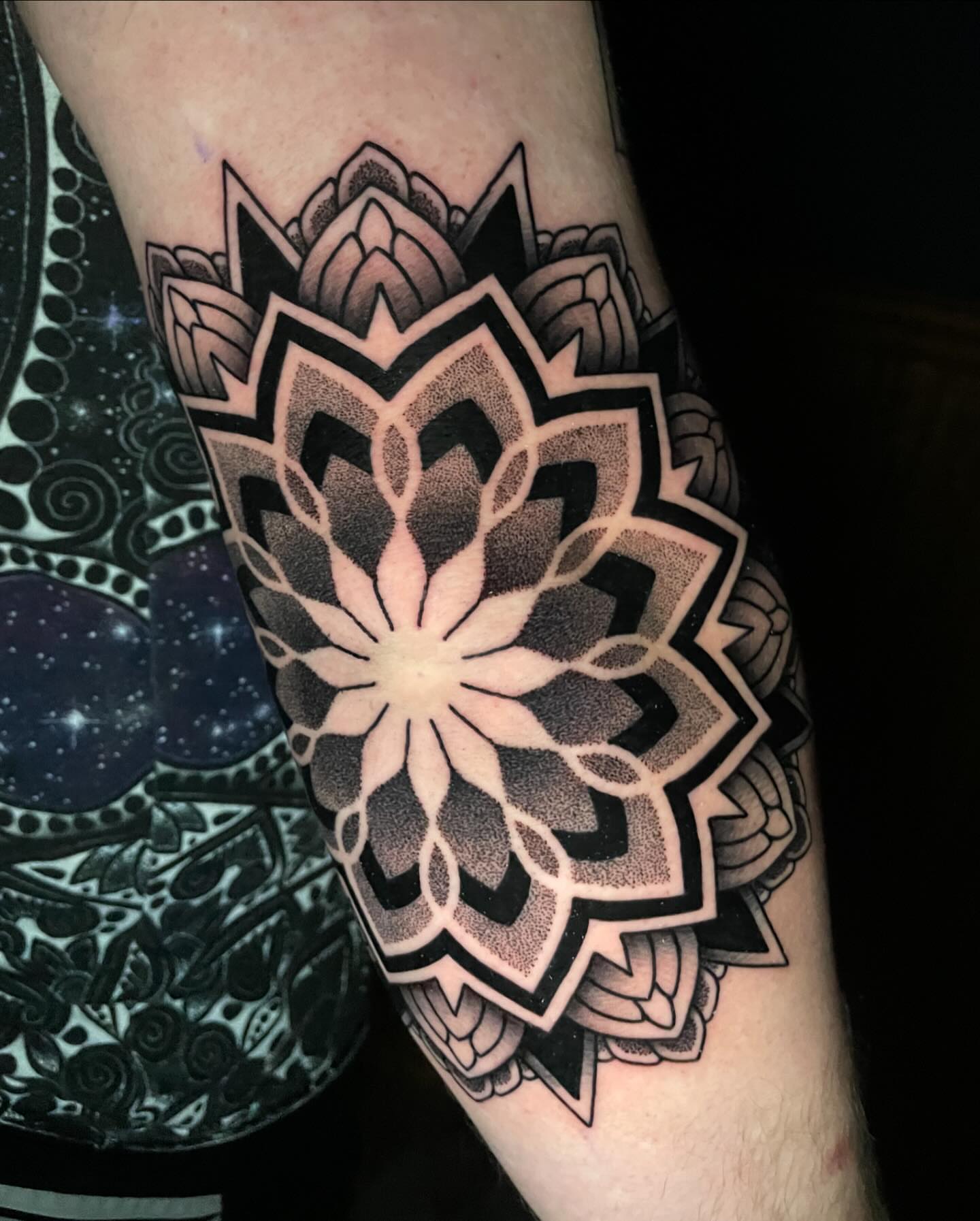 Lotus flower dotwork tattoo on the forearm by Jason Call