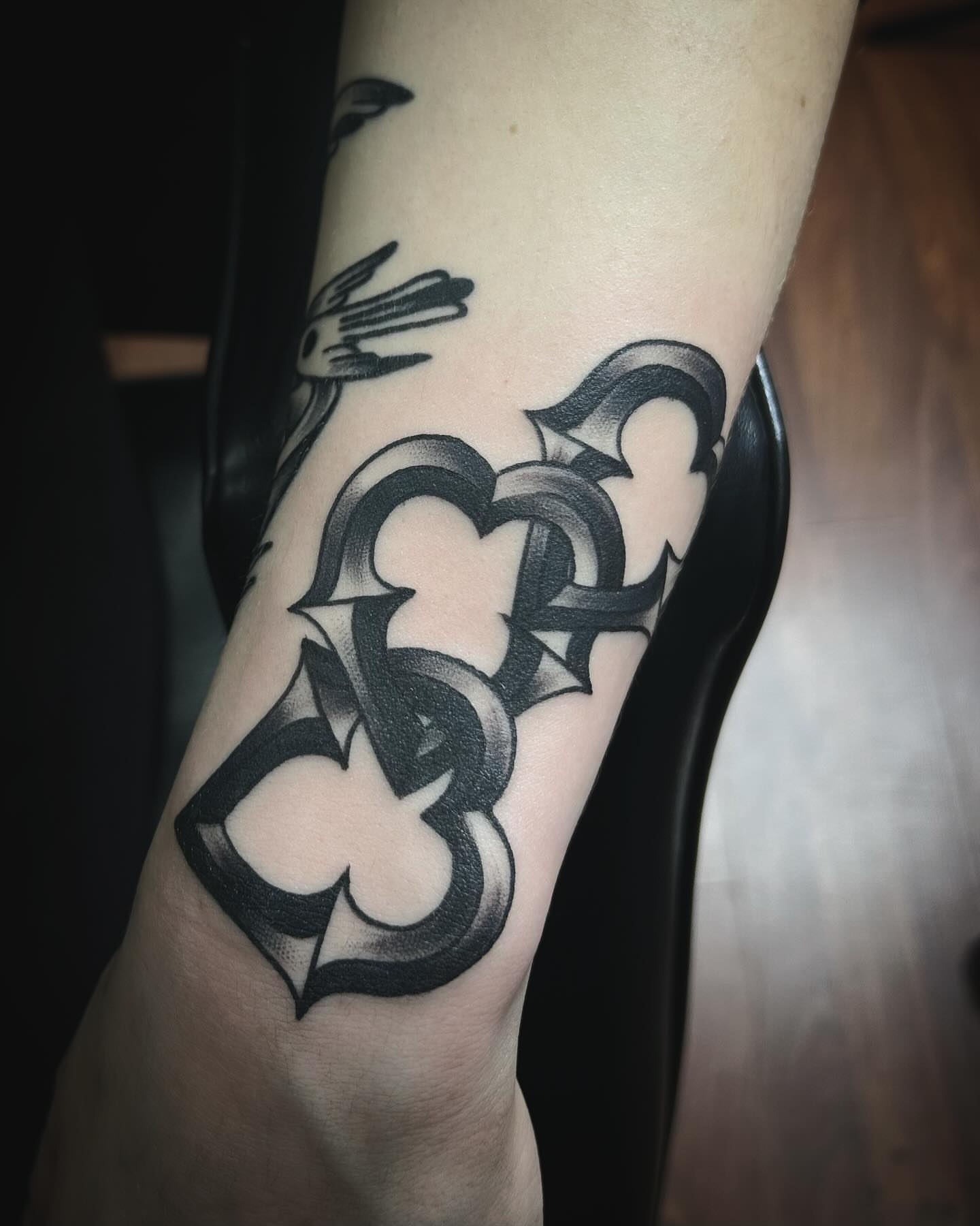 Clover American traditional tattoo on the forearm by Samantha C, Bremerton, Washington