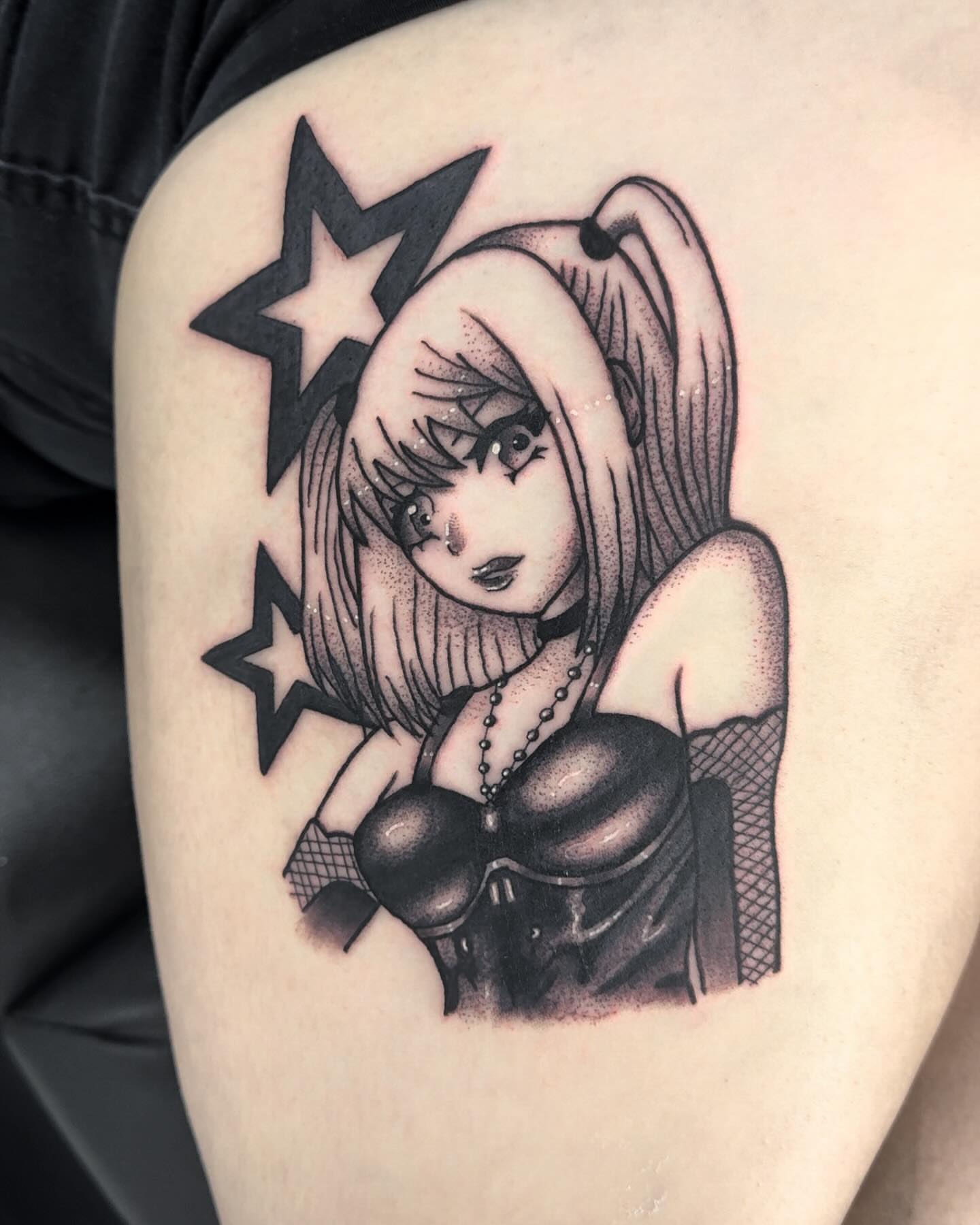 Anime character dotwork tattoo on the upper arm by โโฎโ๐ถ๐๐ฝ๐๐๐ู เฃชโญ las vegas tattoo artist