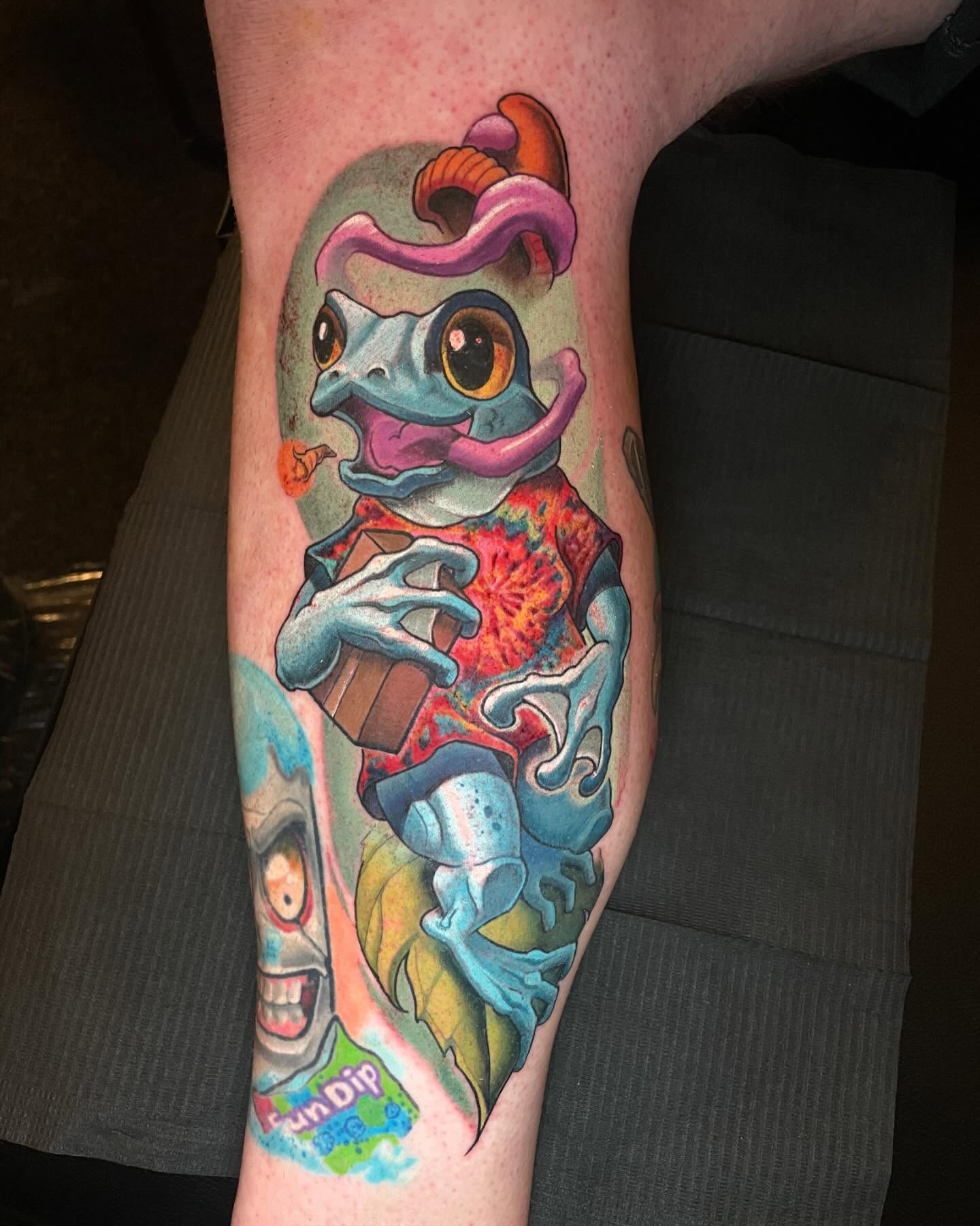 Frog new school tattoo on the forearm by Zoe "Z" Fisk
