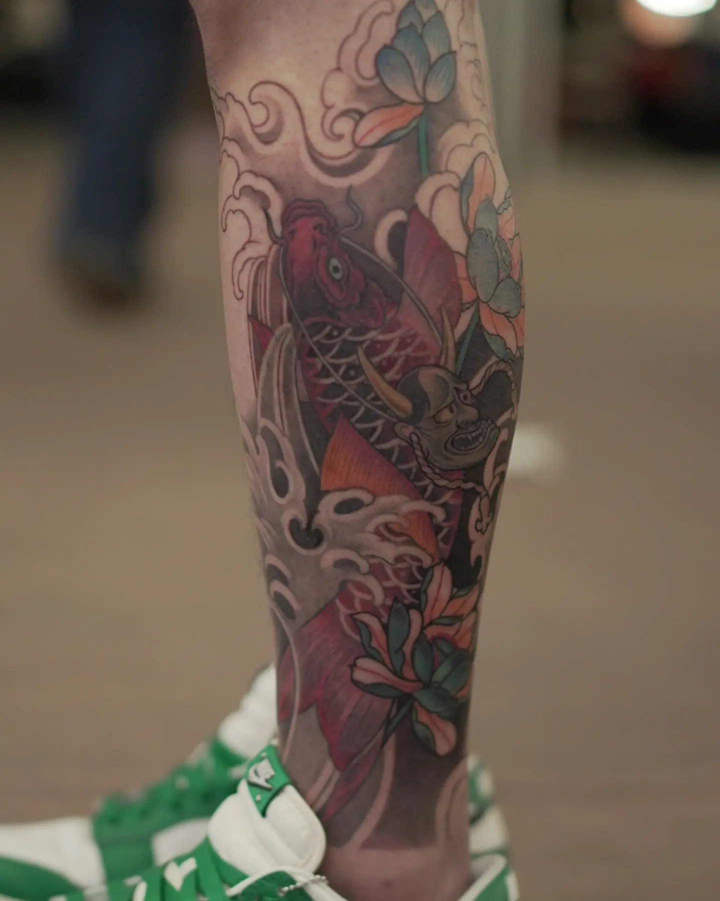Koi fish and mask japanese irezumi tattoo on the forearm by zamix_traditional, San Francisco, California