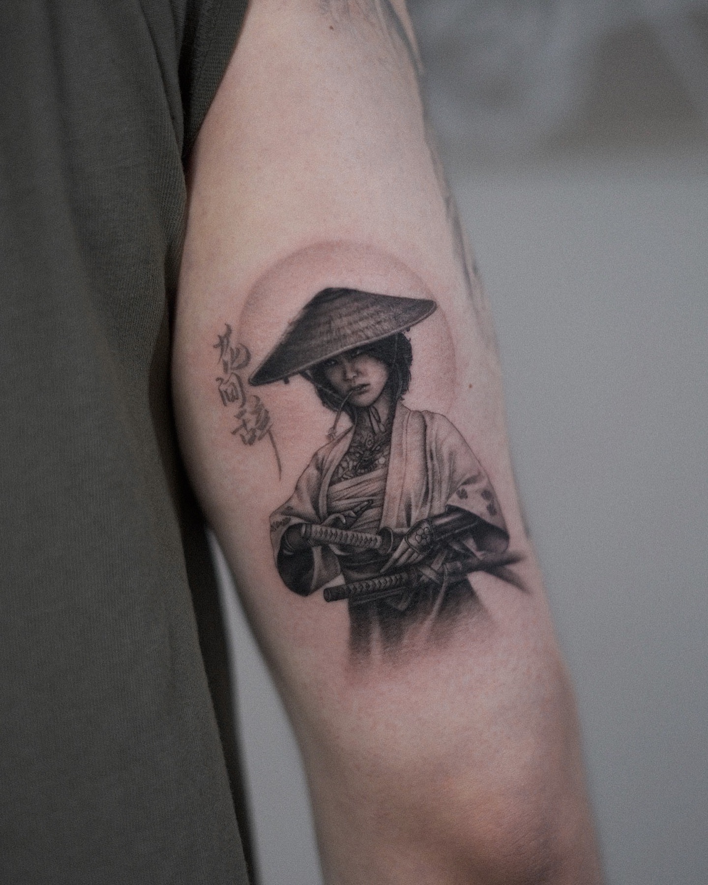 Geisha with sword realism tattoo on the forearm by Oleksandr Moroz