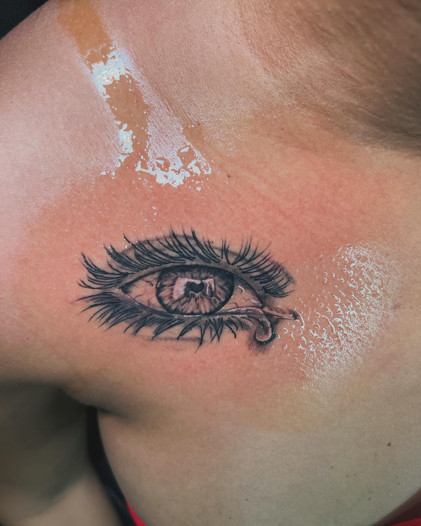Eye realism tattoo on the shoulder by oxideTattoo, Morne-à-l'Eau