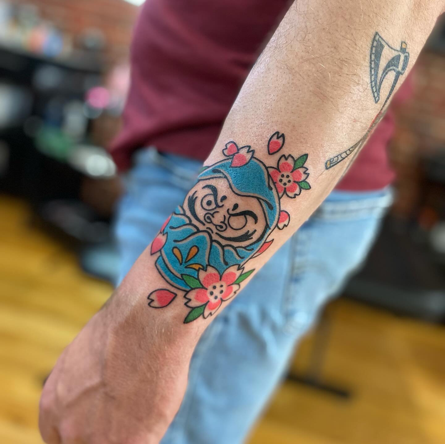 Demon with flowers japanese irezumi tattoo on the forearm by S C O T T