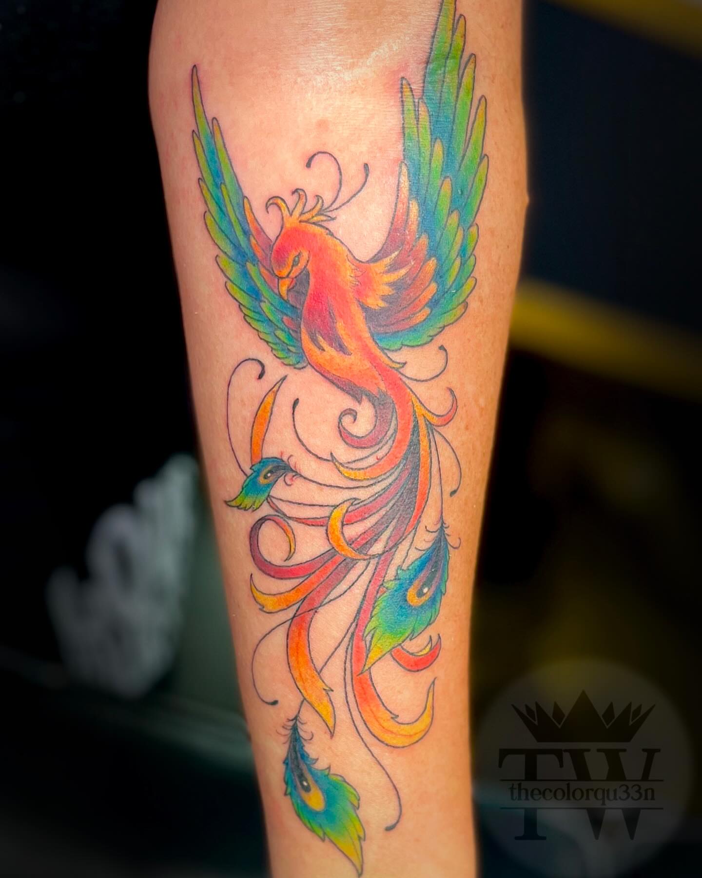 Phoenix new school tattoo on the forearm by Taylor Tha Color Queen
