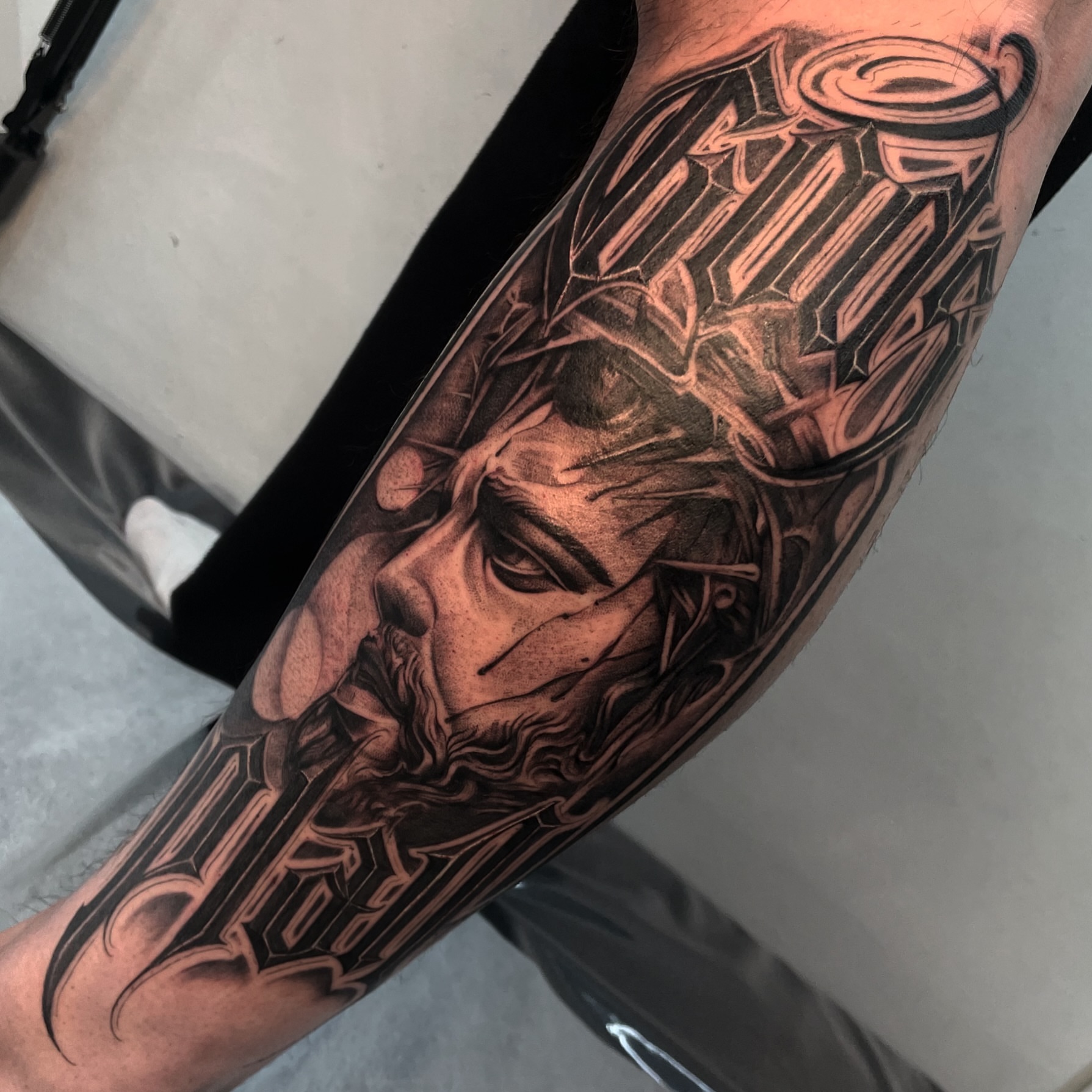 Tattoo by @dopeletterstattoo — black_and_grey, realism