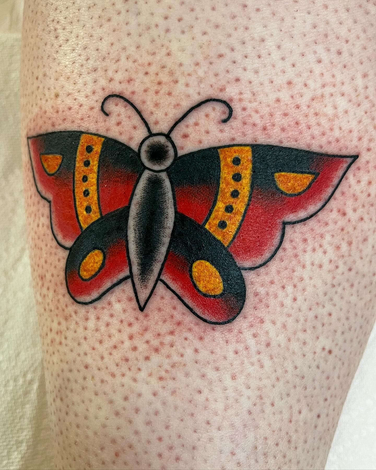 Butterfly American traditional tattoo on the thigh by Pedroux M.