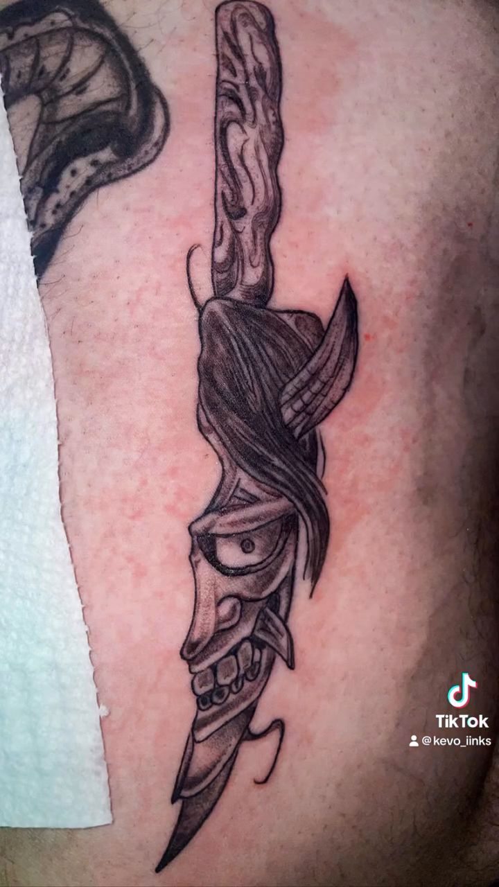 Demon mask and dagger japanese irezumi tattoo by Kevyn Vidal