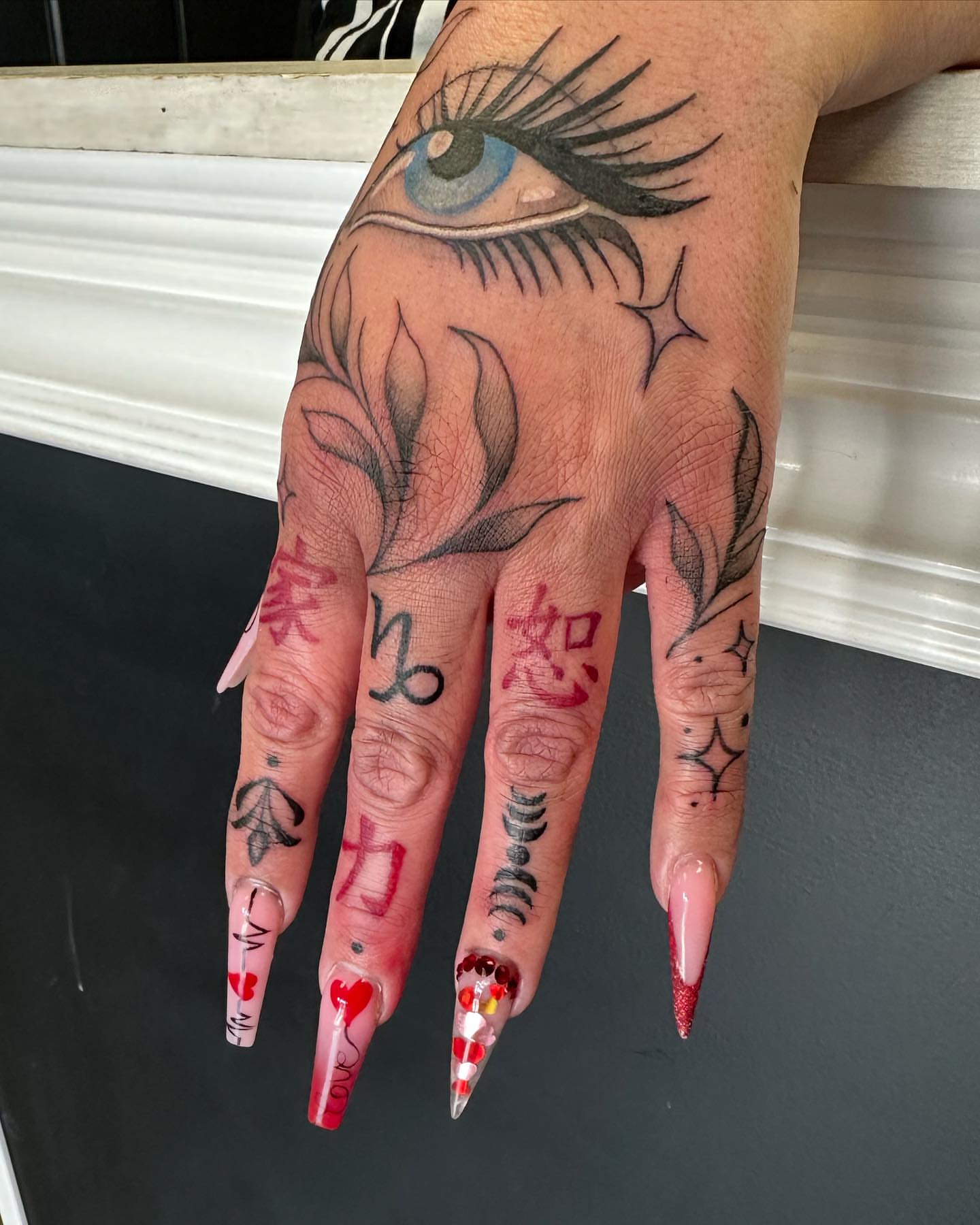 Eye with eyelashes dotwork tattoo on the hand by 𝕵𝖊𝖘𝖘𝖆 𝕭𝖎𝖌𝖊𝖑𝖔𝖜, Harrison, New Jersey