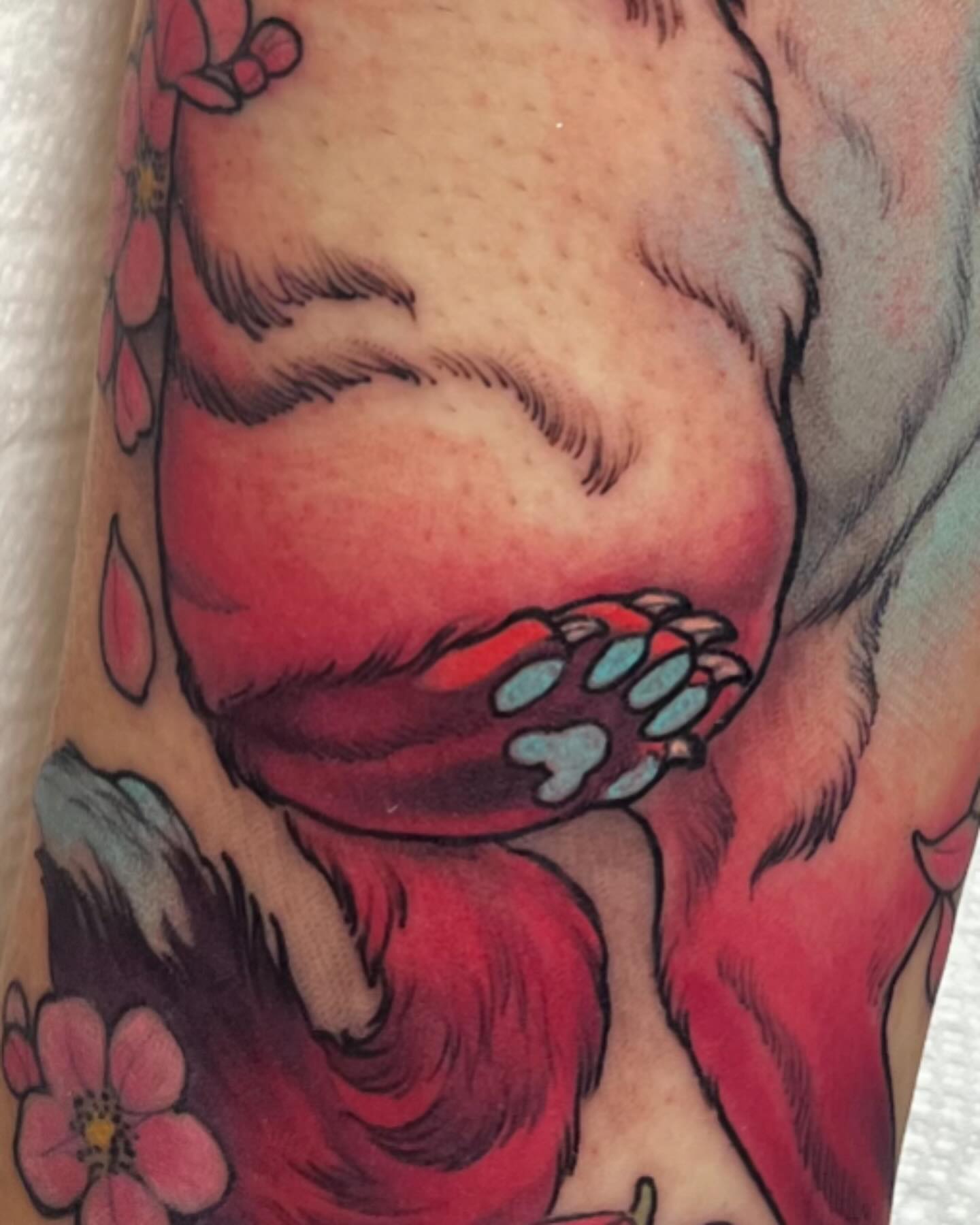 Bear paw realism tattoo on the forearm by Alisha Harding