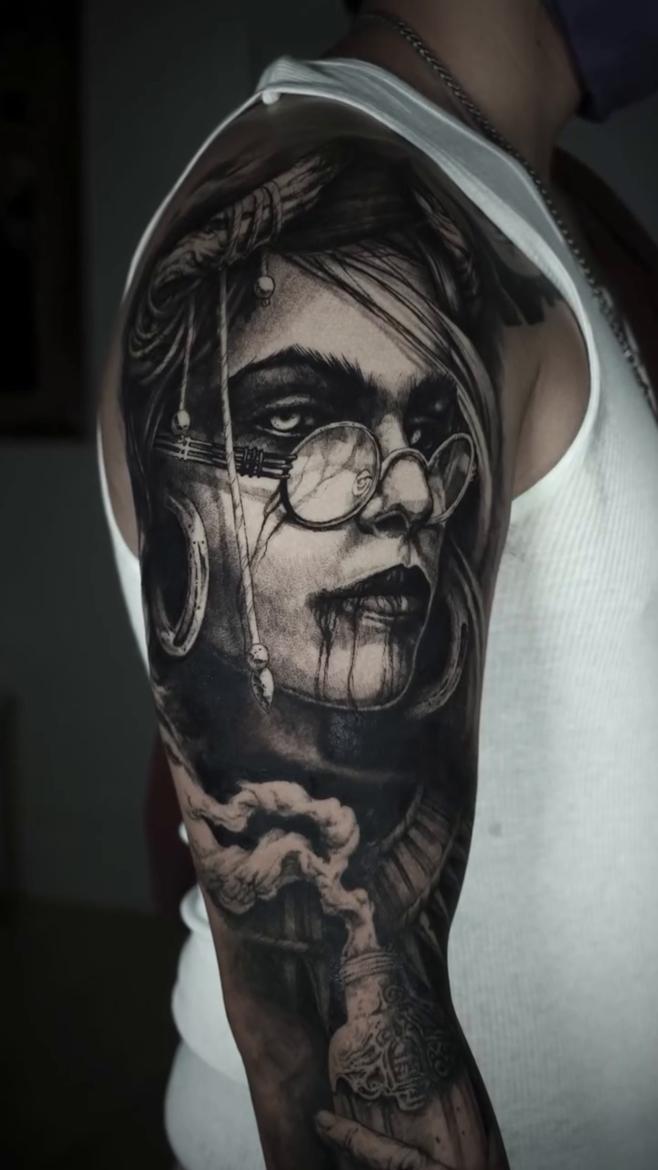 Woman with glasses and fangs dark realism tattoo by Hollow Priest