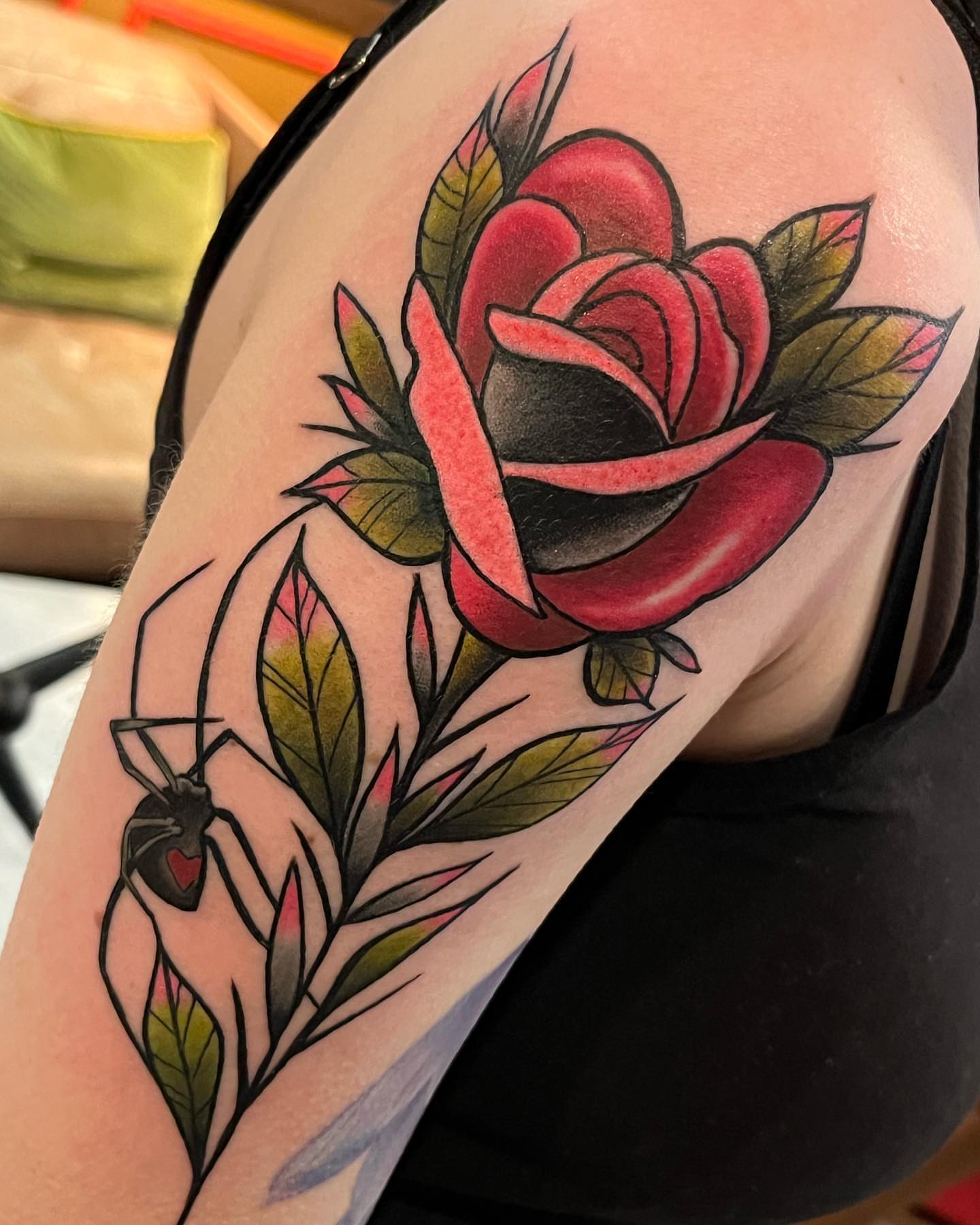 Rose and spider American traditional tattoo on the shoulder by Erick Campion