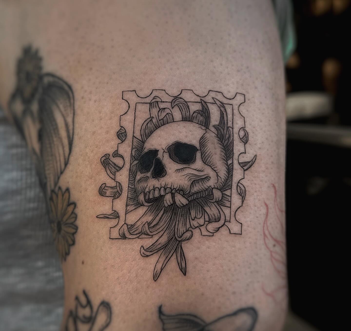 Skull black and grey tattoo on the forearm by Lily K.