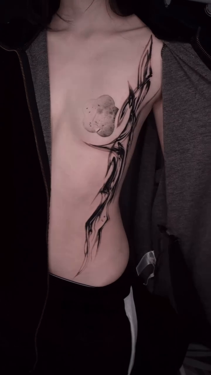 Tattoo by @dowoo_tattoo — blackwork, ornamental
