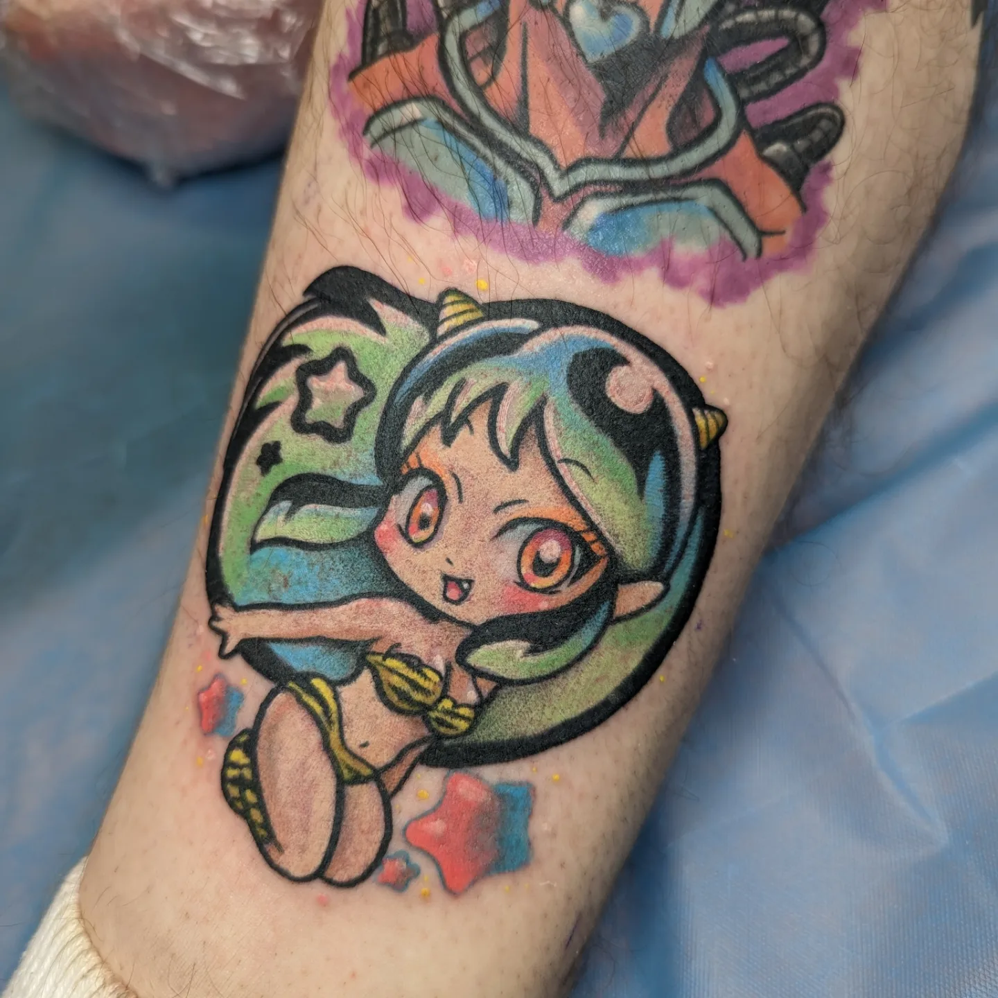 Anime character new school tattoo on the forearm by Harley Fulghum