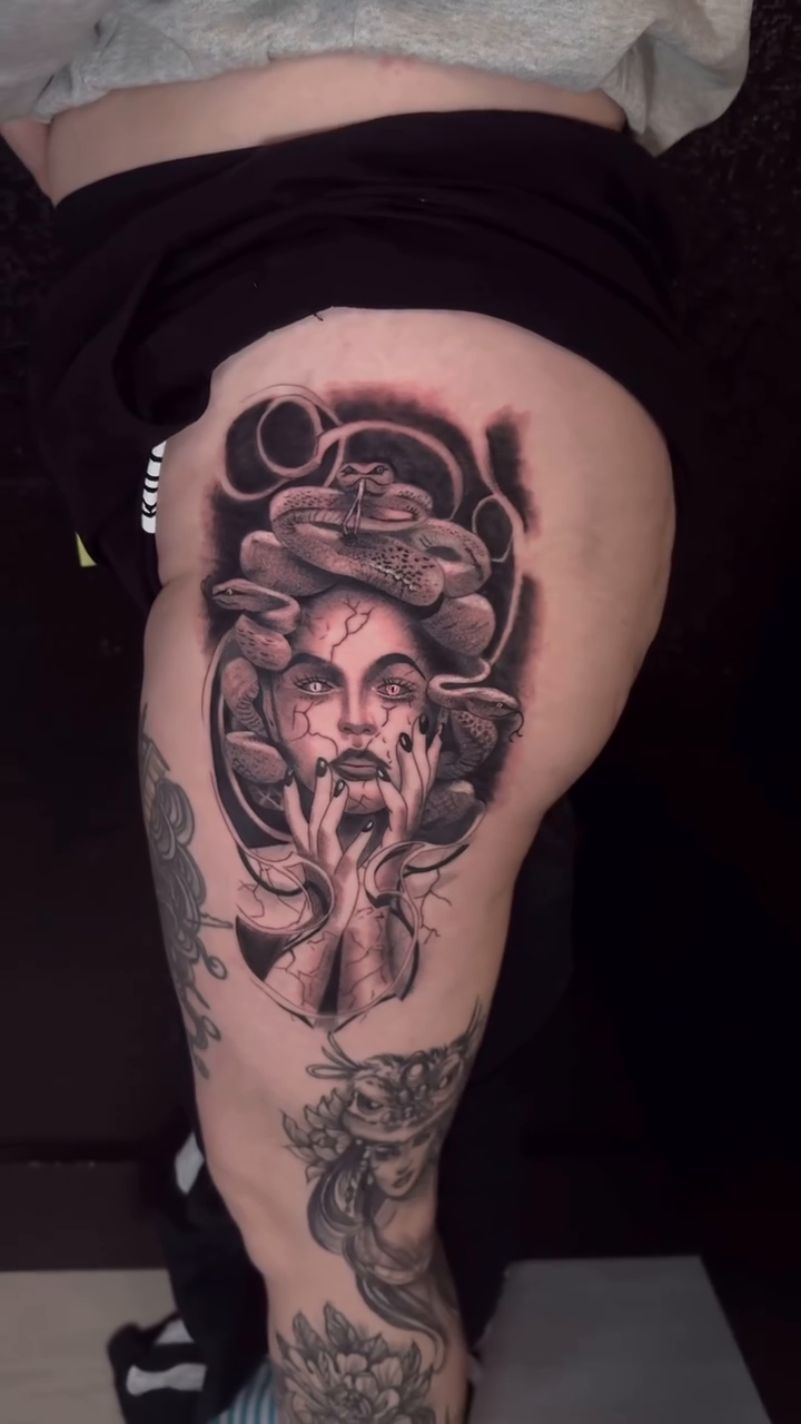 Woman with snake realism tattoo by Chip