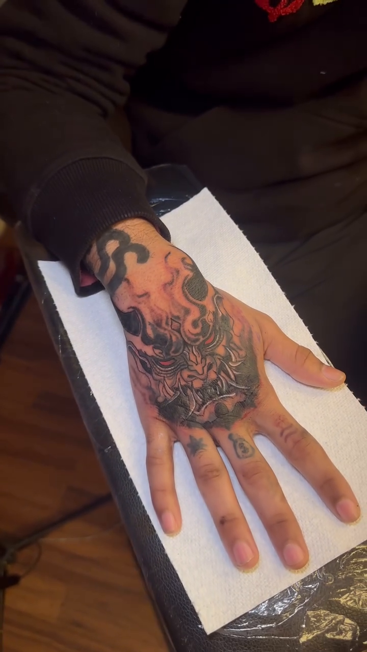 Demon face realism tattoo by Marvin Osorno